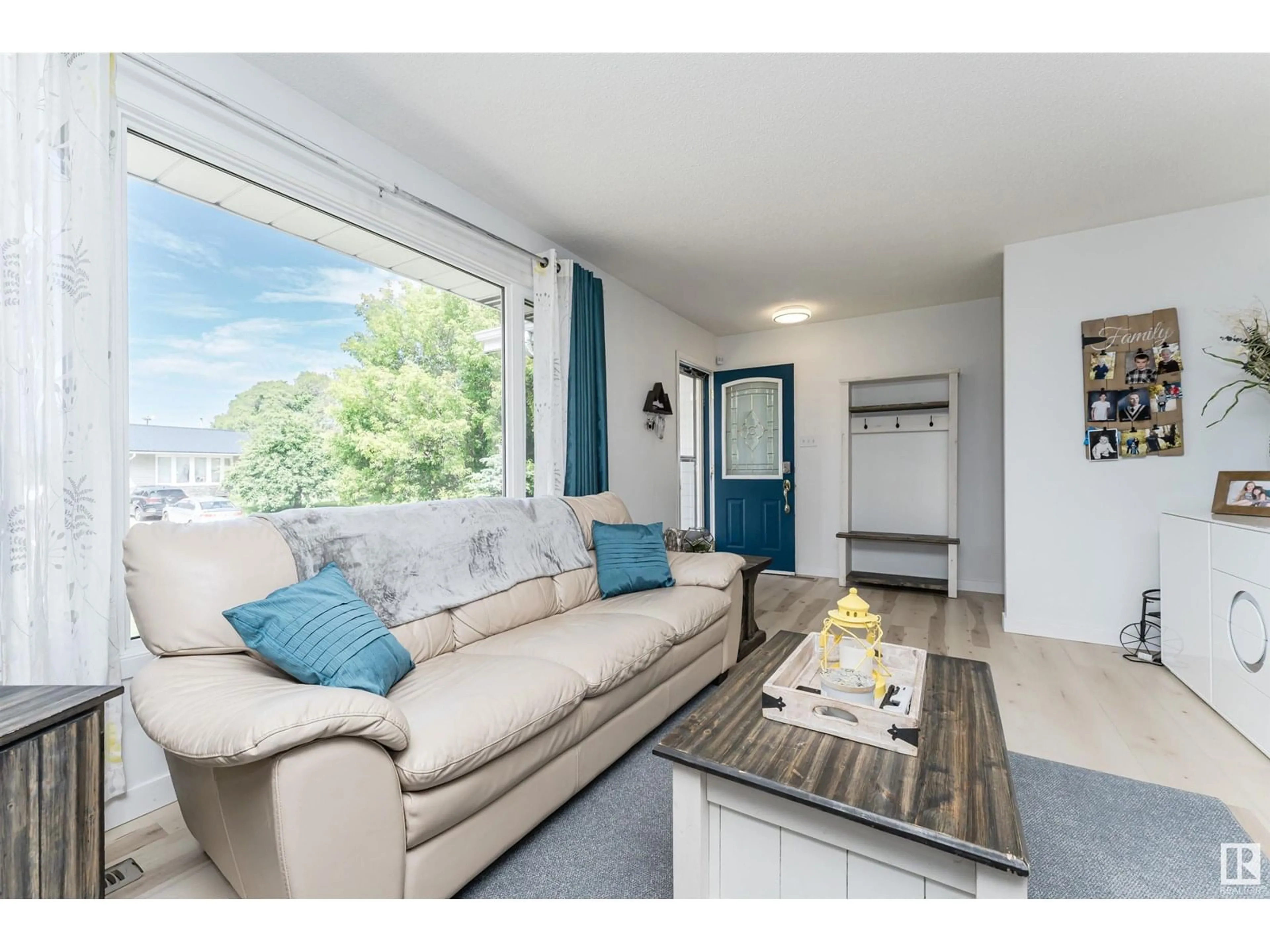 Living room with furniture, wood/laminate floor for 64 WILSON CR, Sherwood Park Alberta T8A3L2