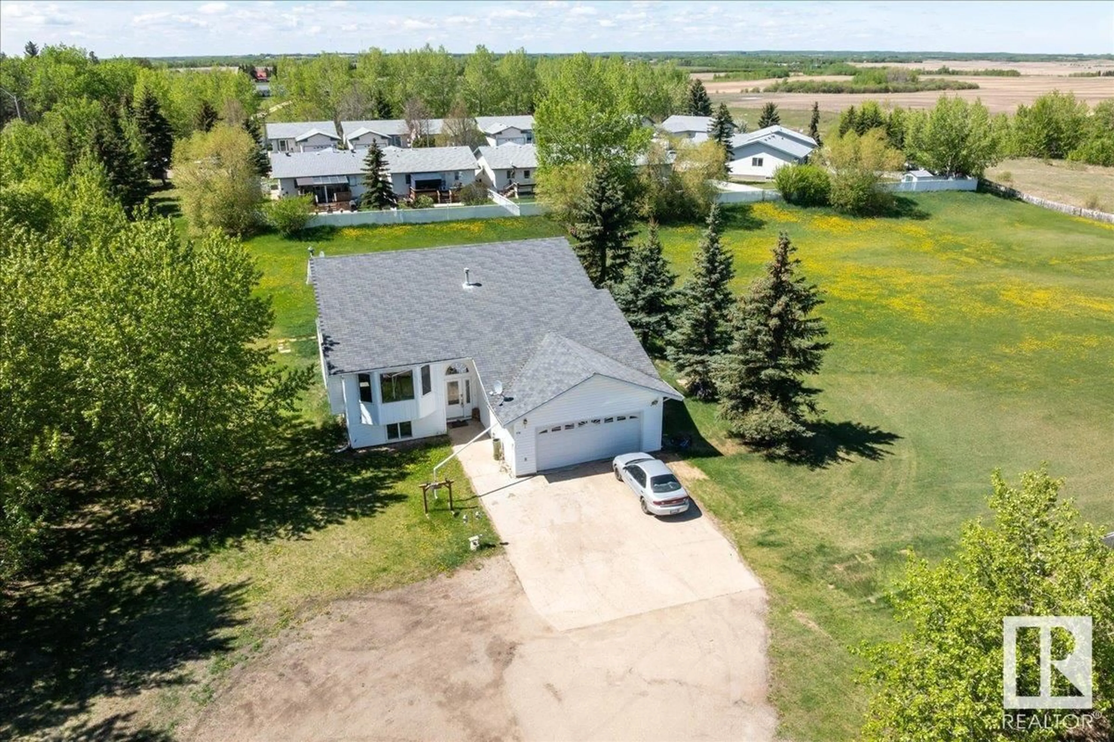 A pic from outside/outdoor area/front of a property/back of a property/a pic from drone, unknown for 5116 58 AV, Tofield Alberta T0B4J0