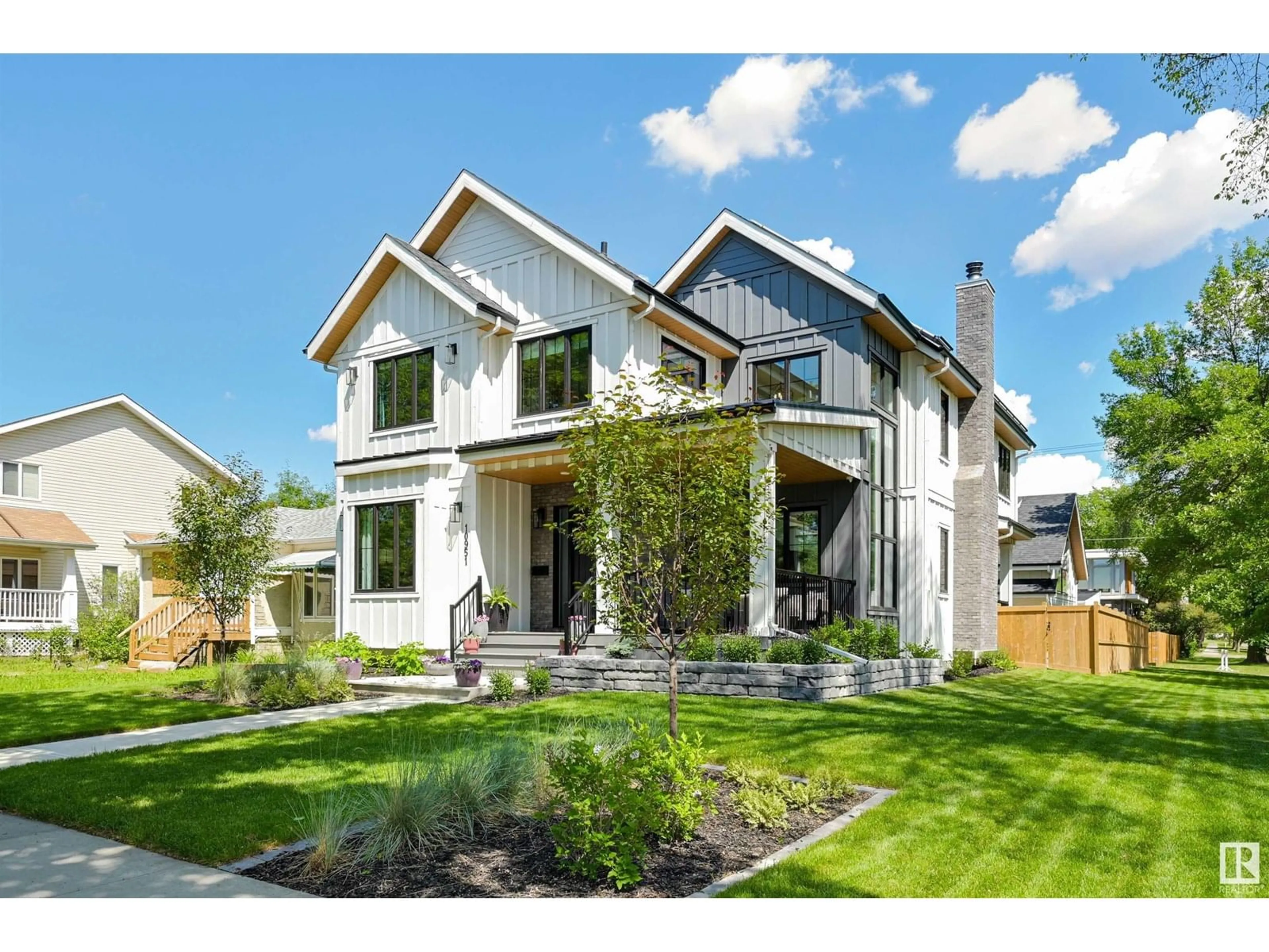 Home with brick exterior material, street for 10951 130 ST NW, Edmonton Alberta T5M0Z6