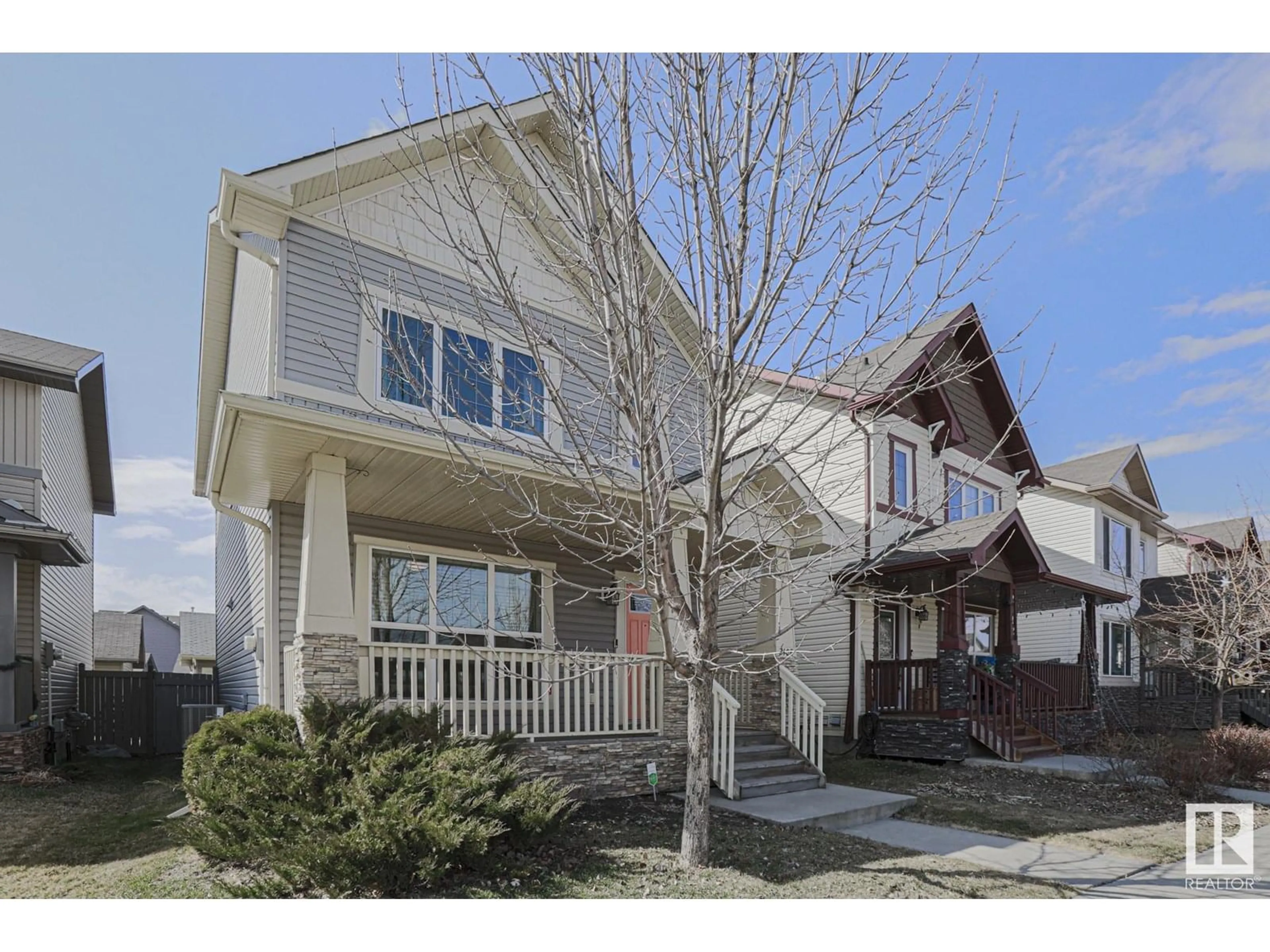 Home with vinyl exterior material, street for 2108 30 ST, Edmonton Alberta T6T0K3