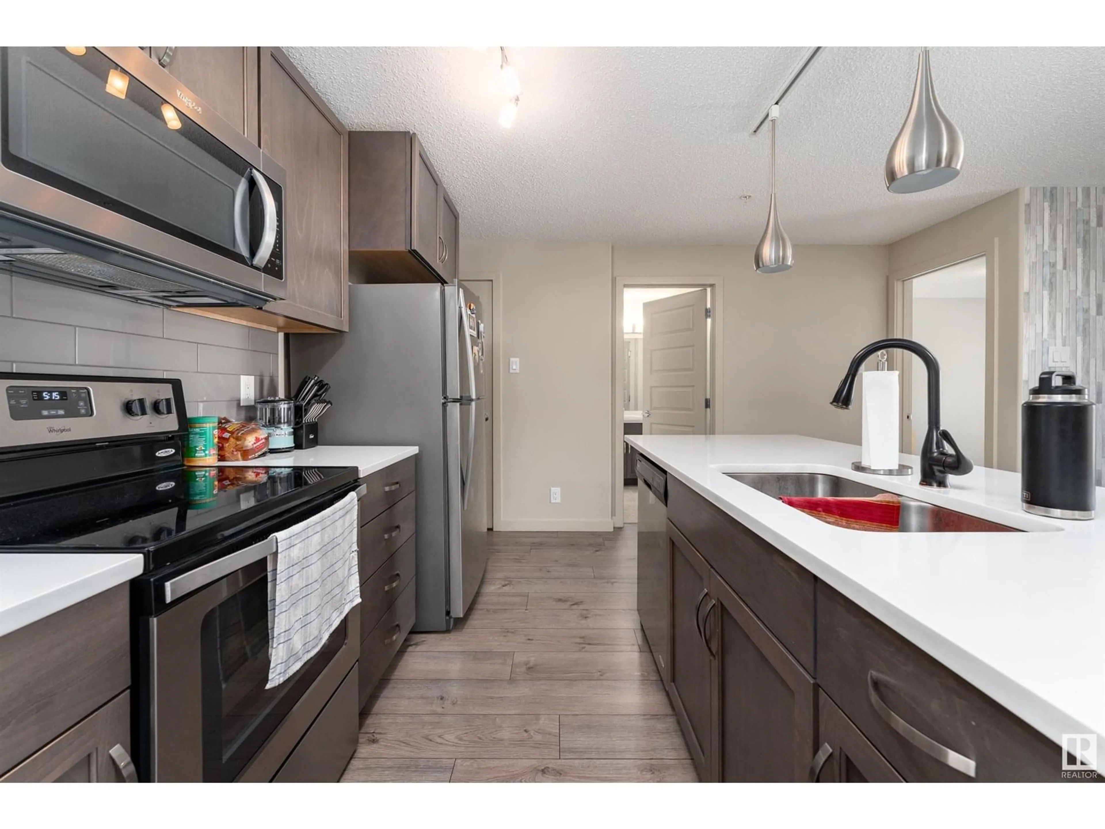 Standard kitchen, unknown for #213 - 4008 SAVARYN DR, Edmonton Alberta T6X2E5