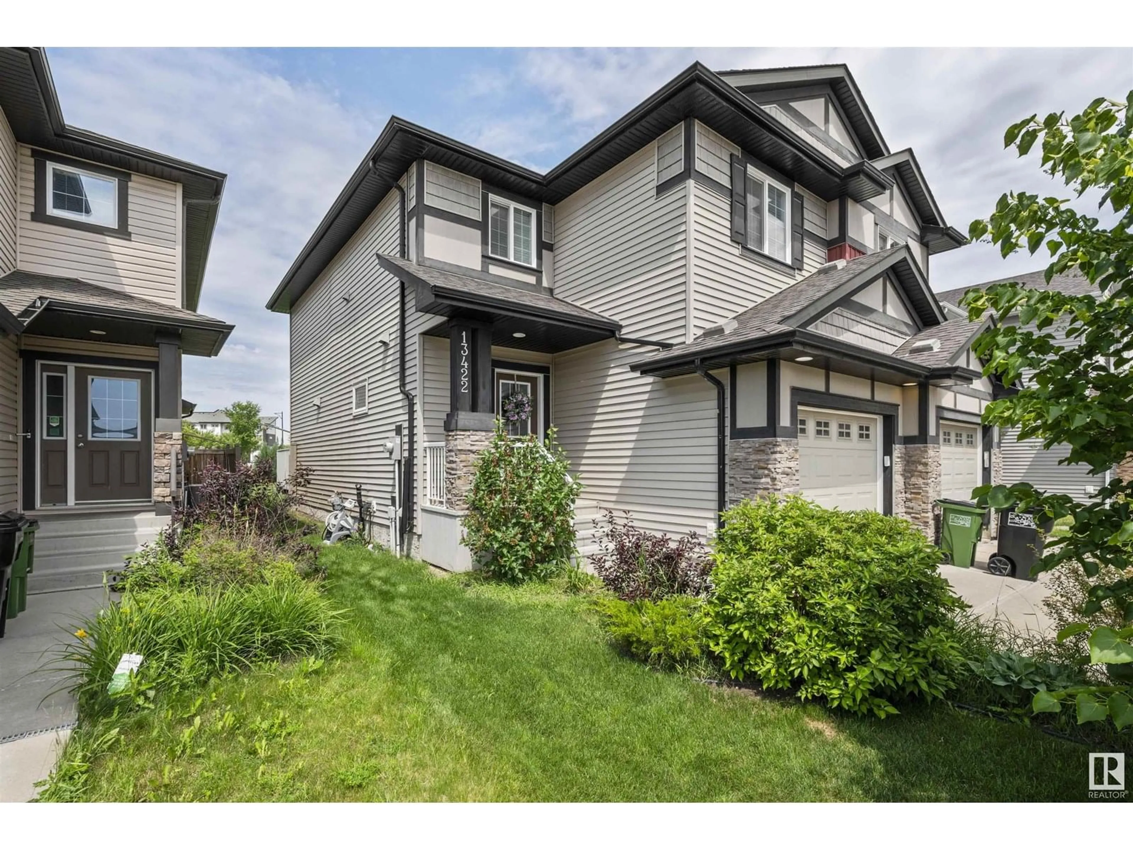 Home with vinyl exterior material, street for NW - 13422 166 AV, Edmonton Alberta T6V0G6