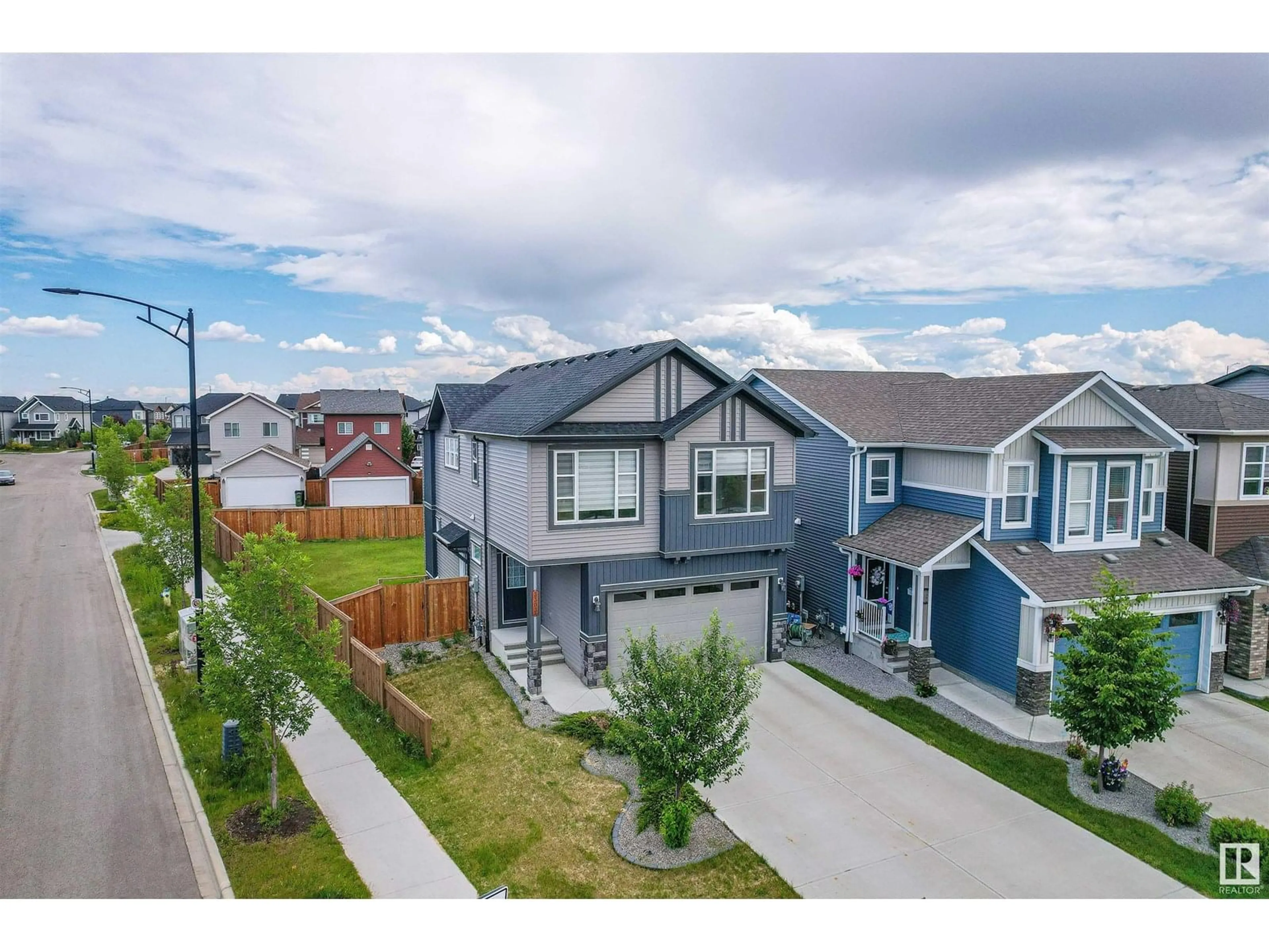 A pic from outside/outdoor area/front of a property/back of a property/a pic from drone, street for SW - 3303 CHECKNITA CM, Edmonton Alberta T6W4E8