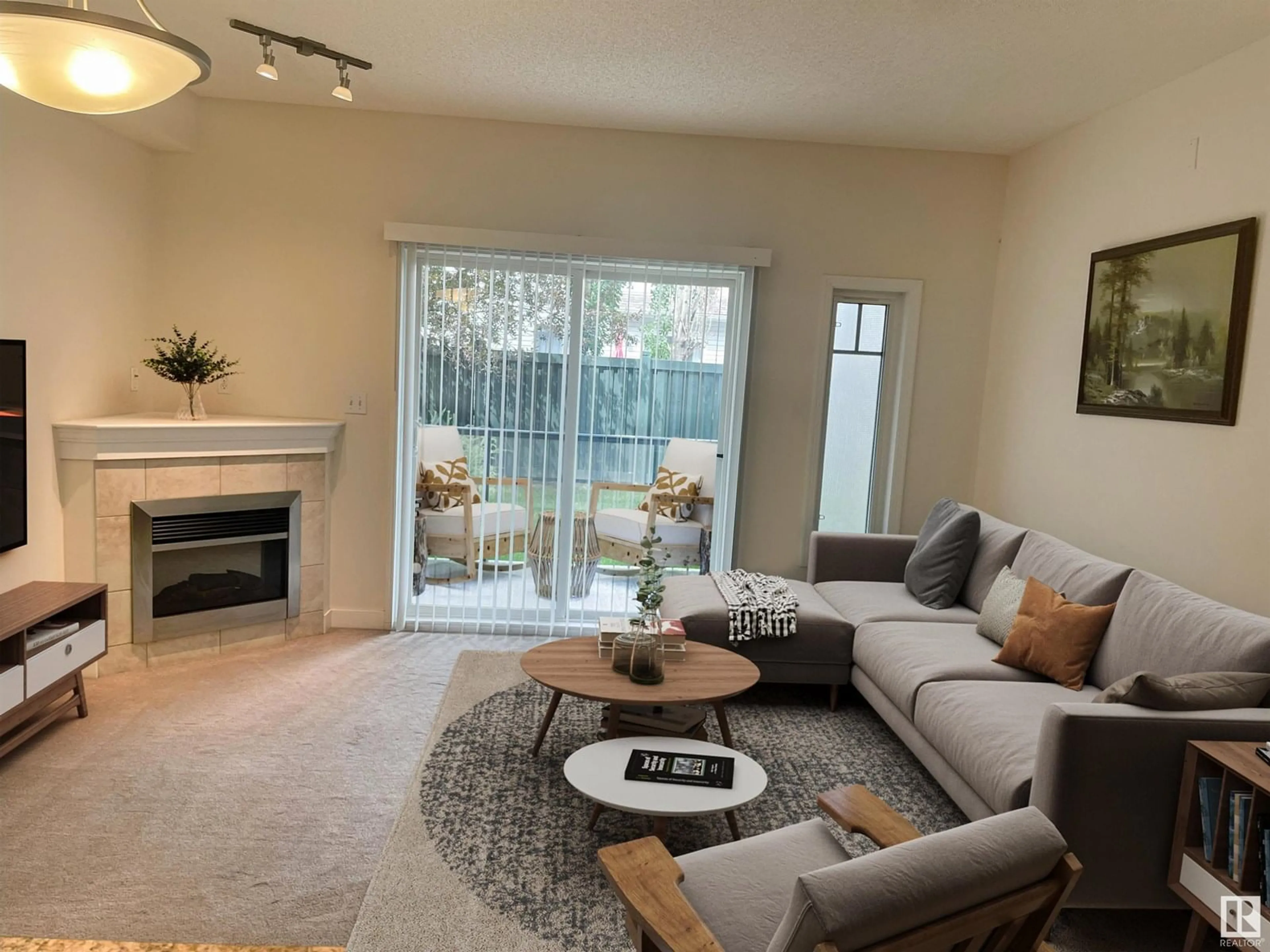 Living room with furniture, unknown for #105 - 2035 GRANTHAM COURT, Edmonton Alberta T5T3X4