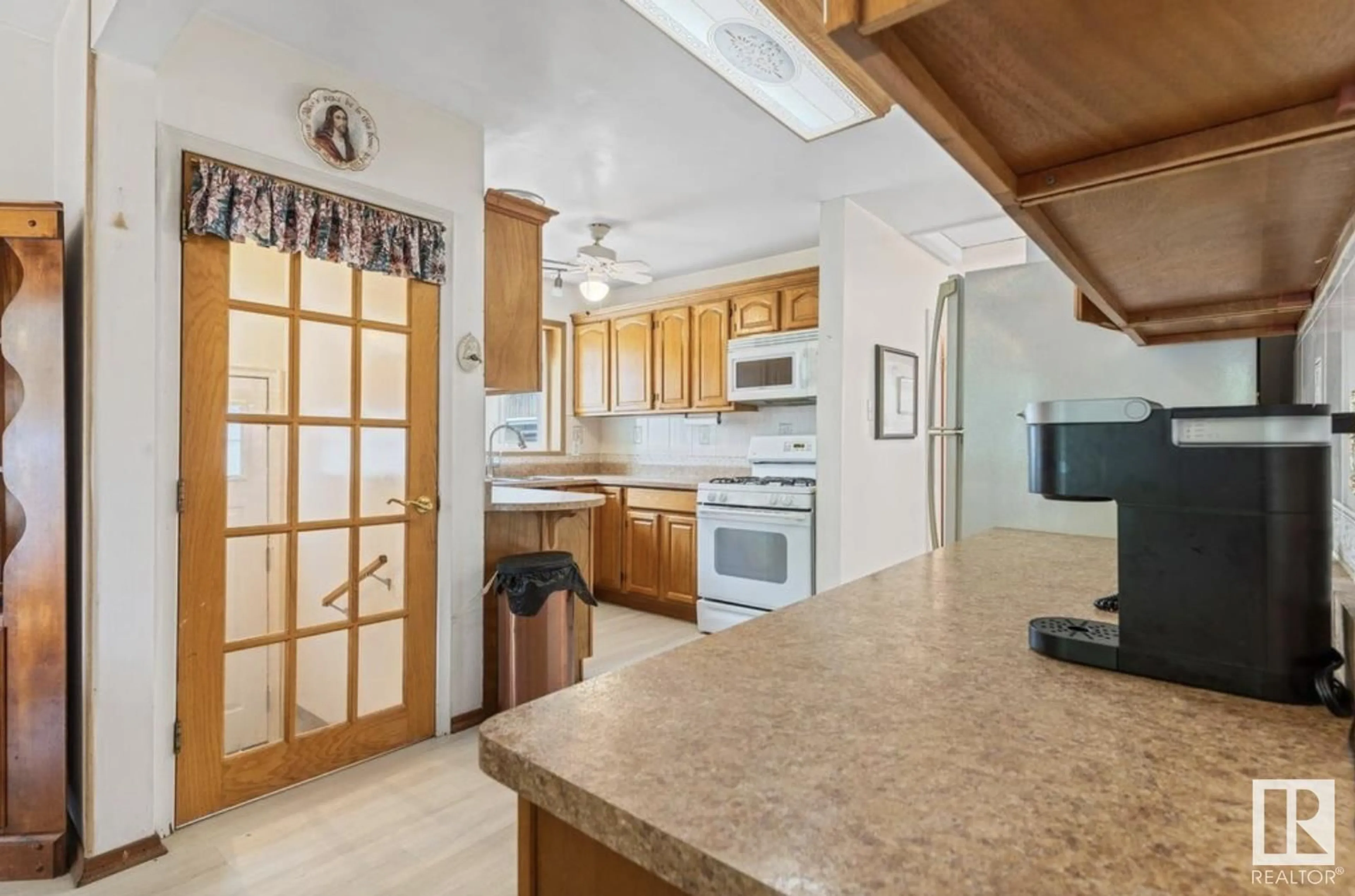 Open concept kitchen, ceramic/tile floor for 7803 130 AVENUE AVENUE, Edmonton Alberta T5C1Y4