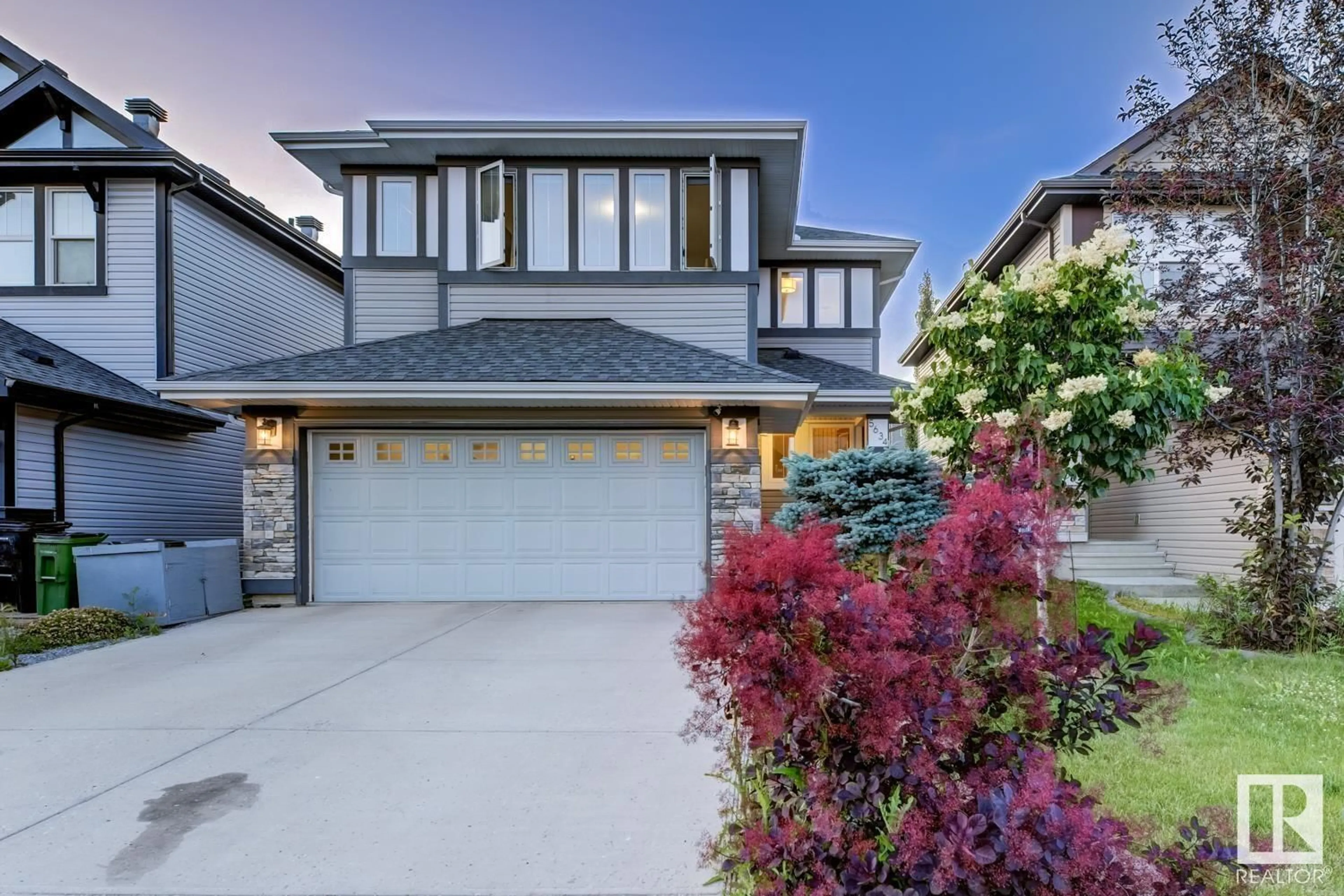 Home with vinyl exterior material, street for 5634 175A AV, Edmonton Alberta T5Y0T7