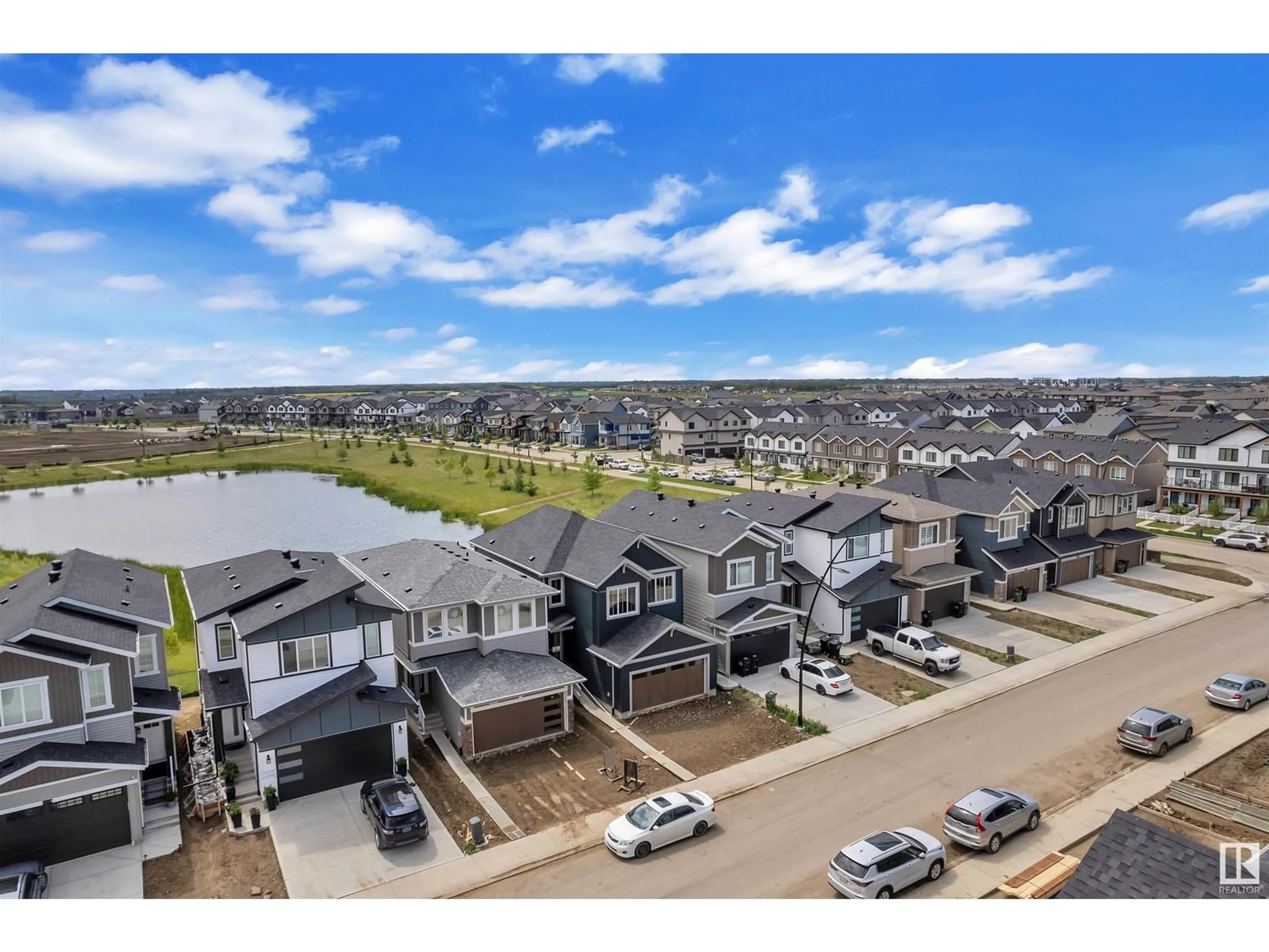 A pic from outside/outdoor area/front of a property/back of a property/a pic from drone, mountain view for 19131 29 AV, Edmonton Alberta T6M3B5