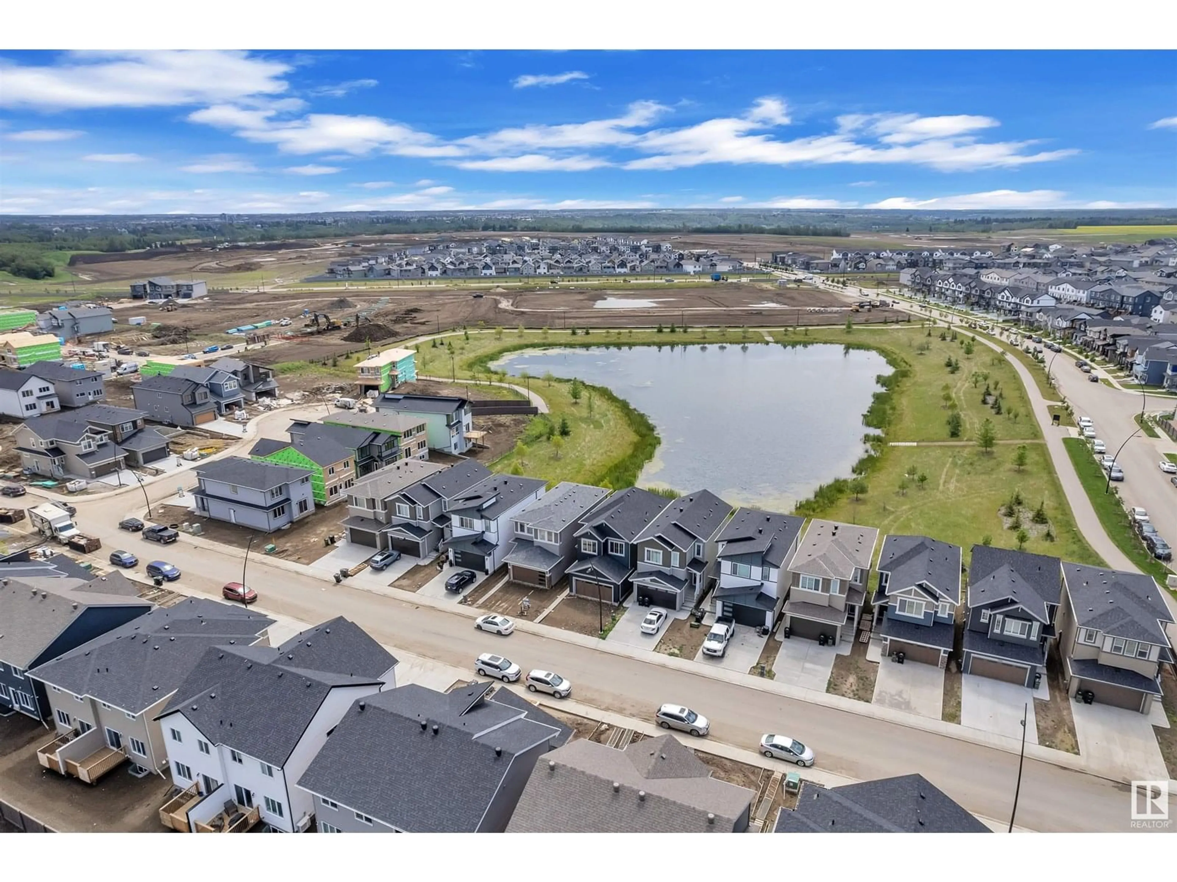 A pic from outside/outdoor area/front of a property/back of a property/a pic from drone, water/lake/river/ocean view for 19131 29 AV, Edmonton Alberta T6M3B5