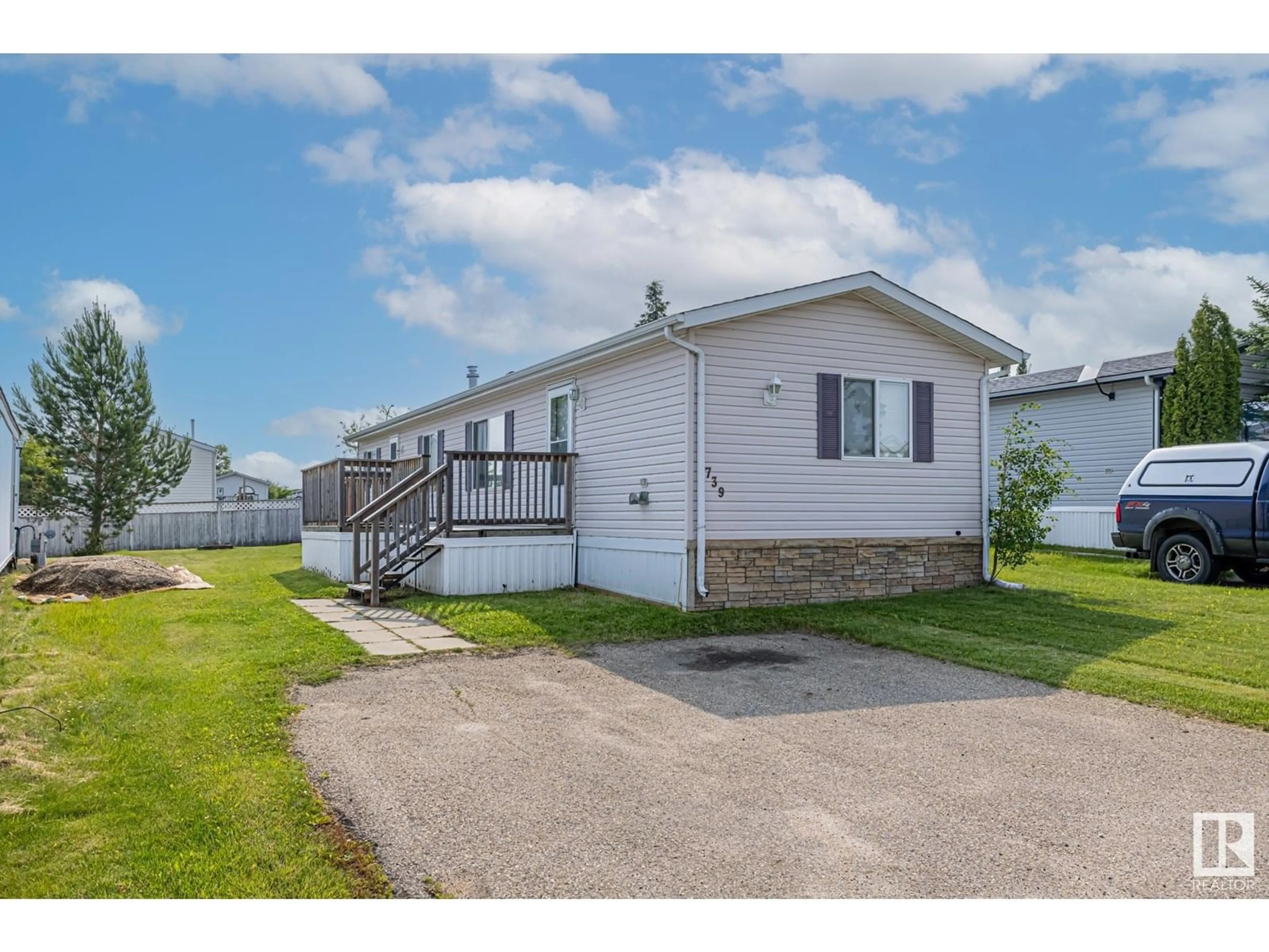 Home with vinyl exterior material, street for 739 53222 RANGE ROAD ROAD, Rural Parkland County Alberta T7X3X6