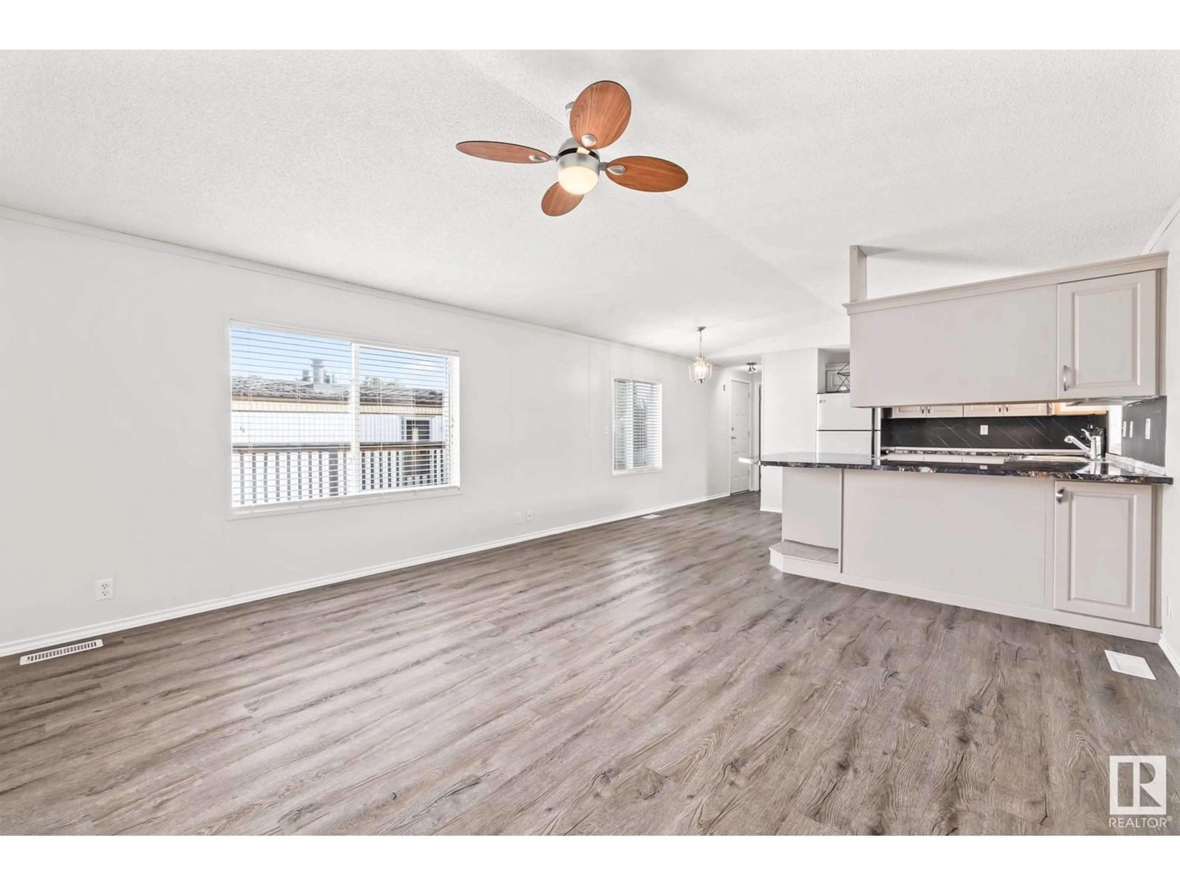 Open concept kitchen, wood/laminate floor for 739 53222 RANGE ROAD ROAD, Rural Parkland County Alberta T7X3X6