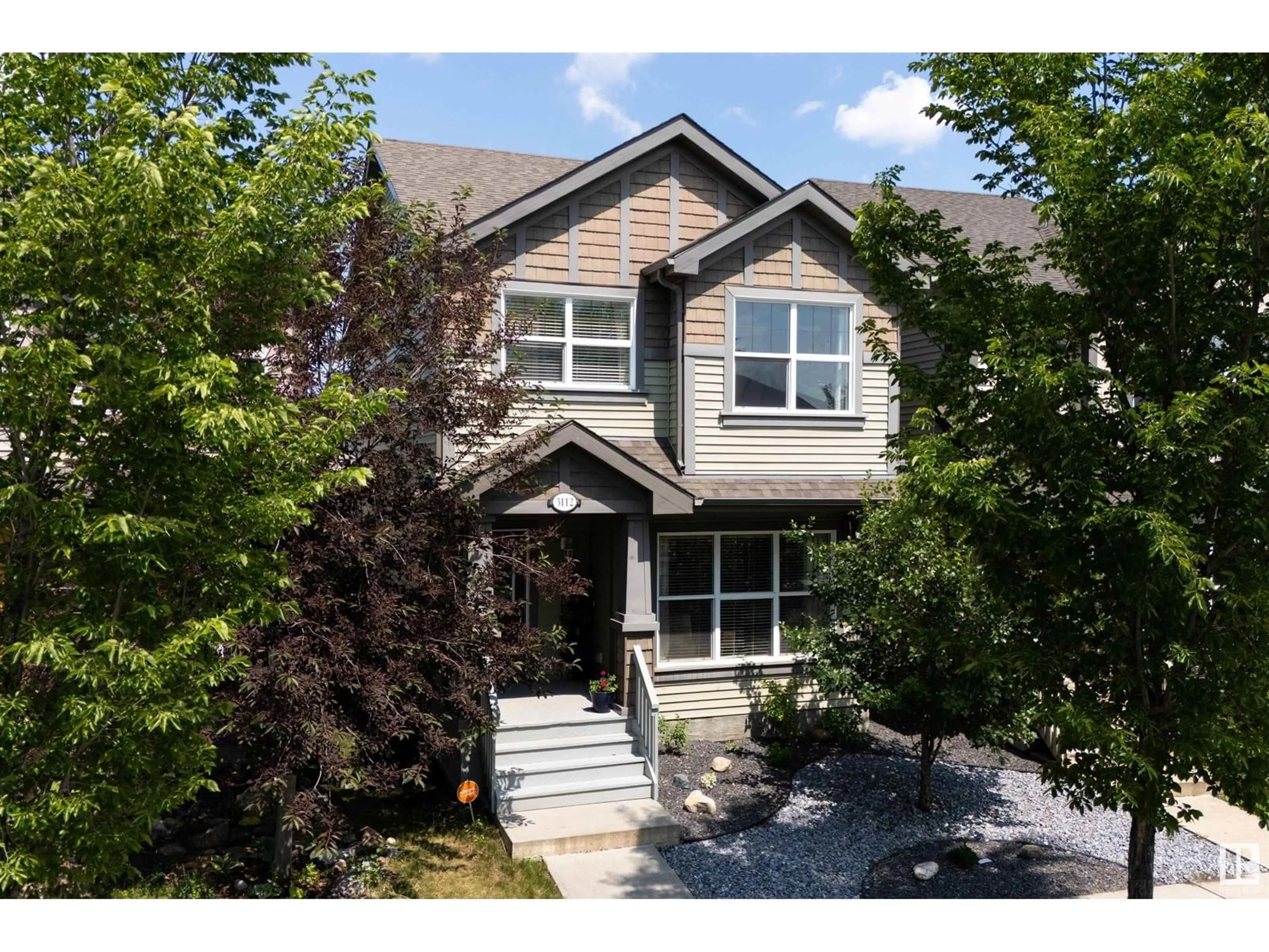 Home with vinyl exterior material, street for 3112 PAISLEY RD, Edmonton Alberta T6W1A3