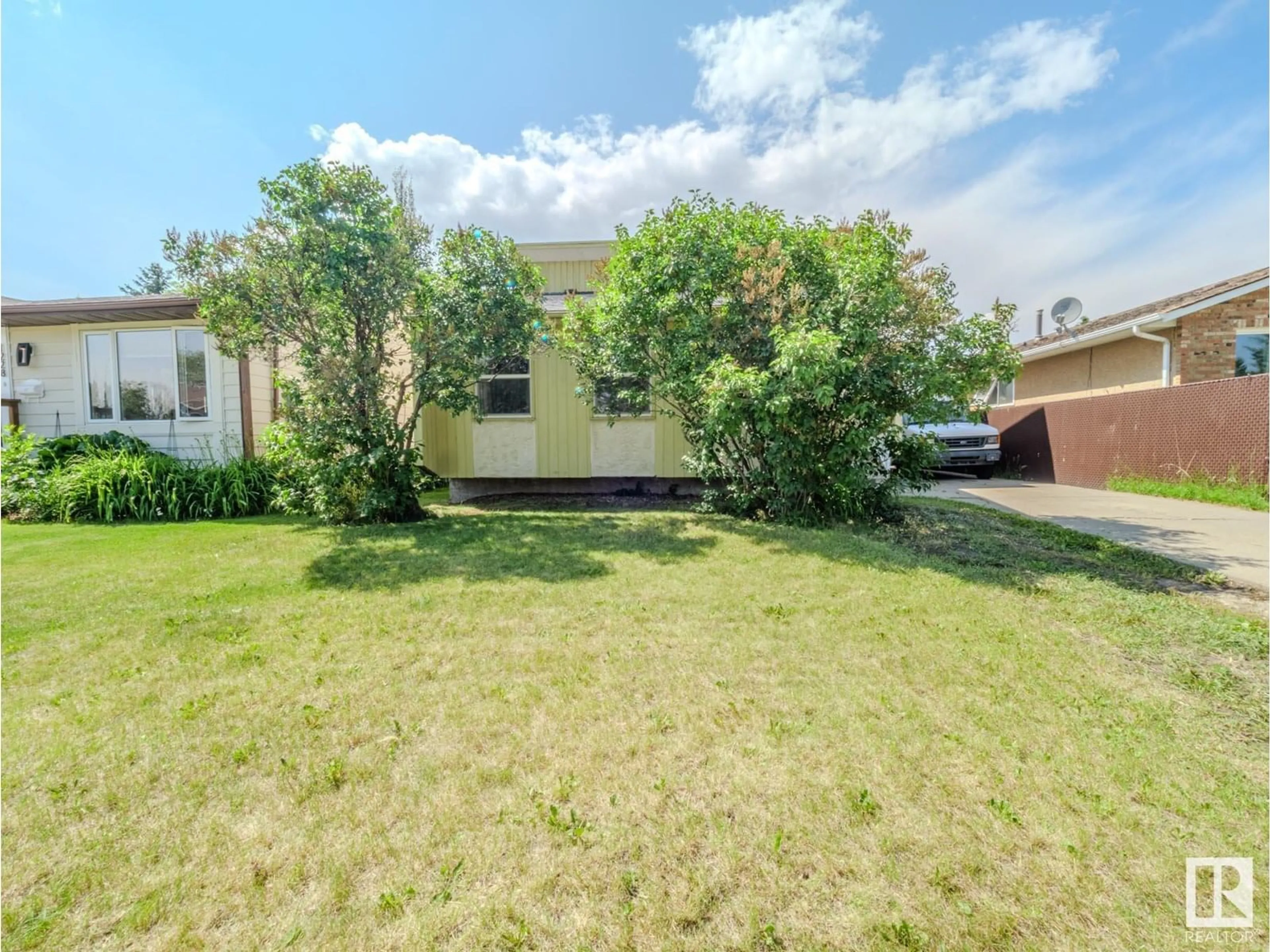A pic from outside/outdoor area/front of a property/back of a property/a pic from drone, street for 1232 65 ST, Edmonton Alberta T6L2E7