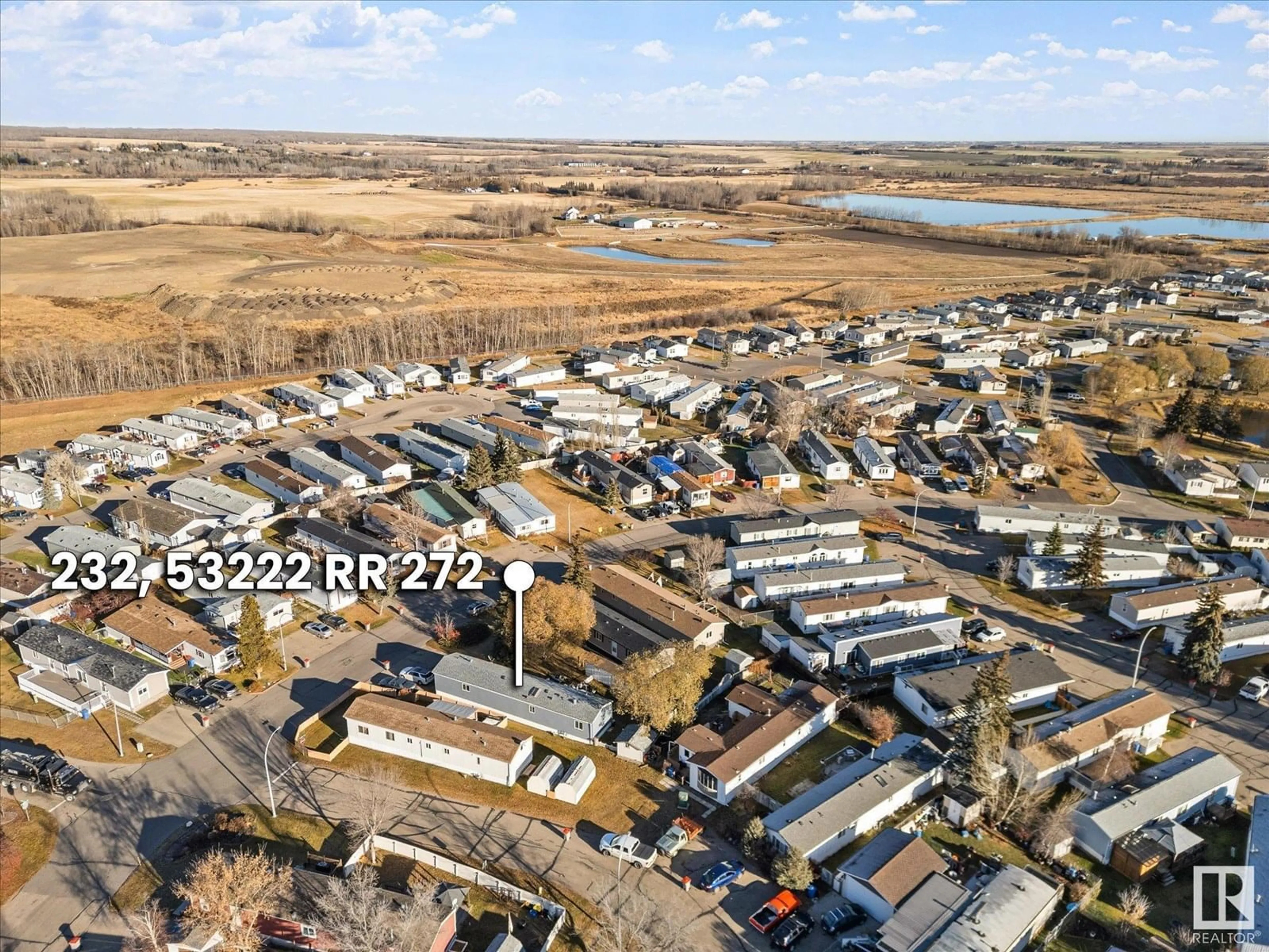 A pic from outside/outdoor area/front of a property/back of a property/a pic from drone, water/lake/river/ocean view for 53222 - 232 RANGE ROAD 272, Rural Parkland County Alberta T7X3N8