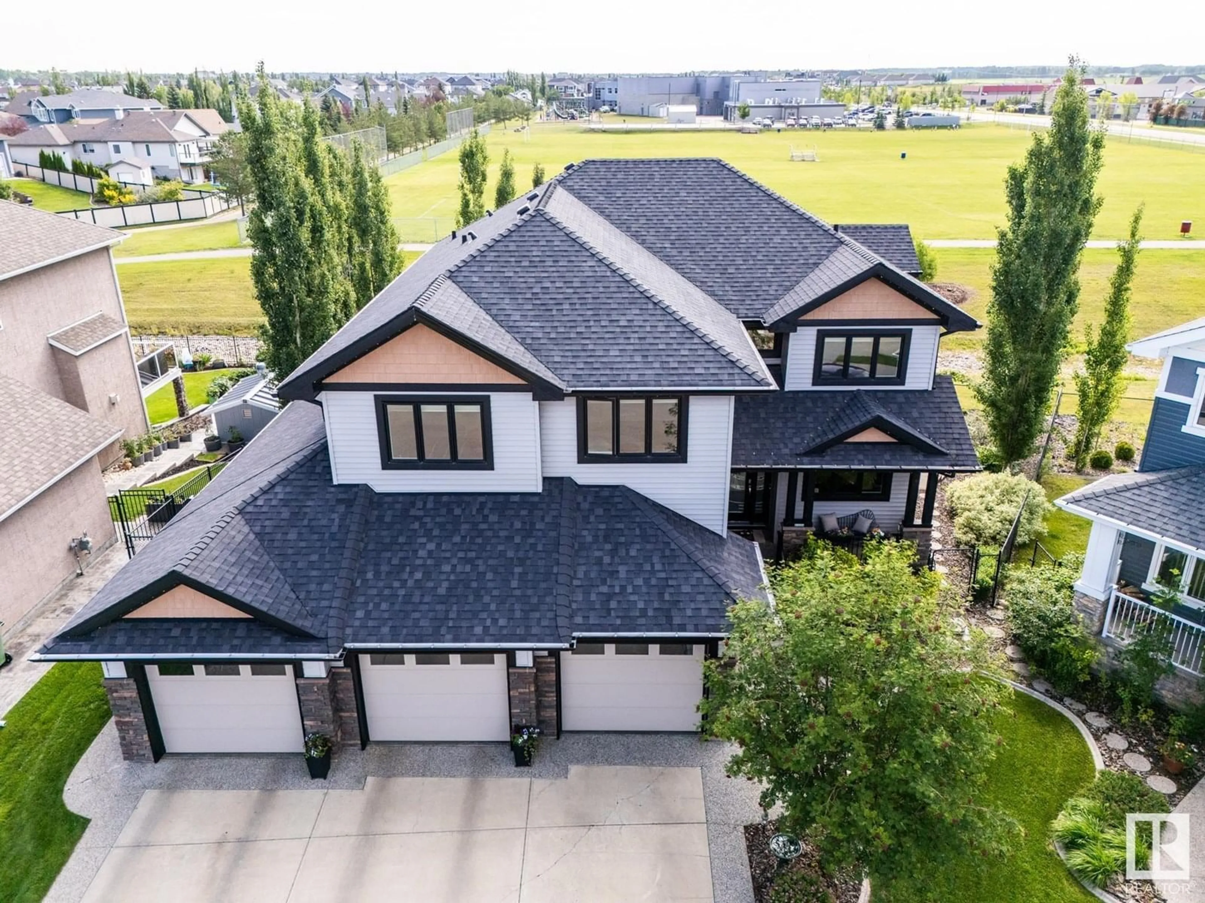 A pic from outside/outdoor area/front of a property/back of a property/a pic from drone, mountain view for 3011 MONTROSE BV, Beaumont Alberta T6X0C1