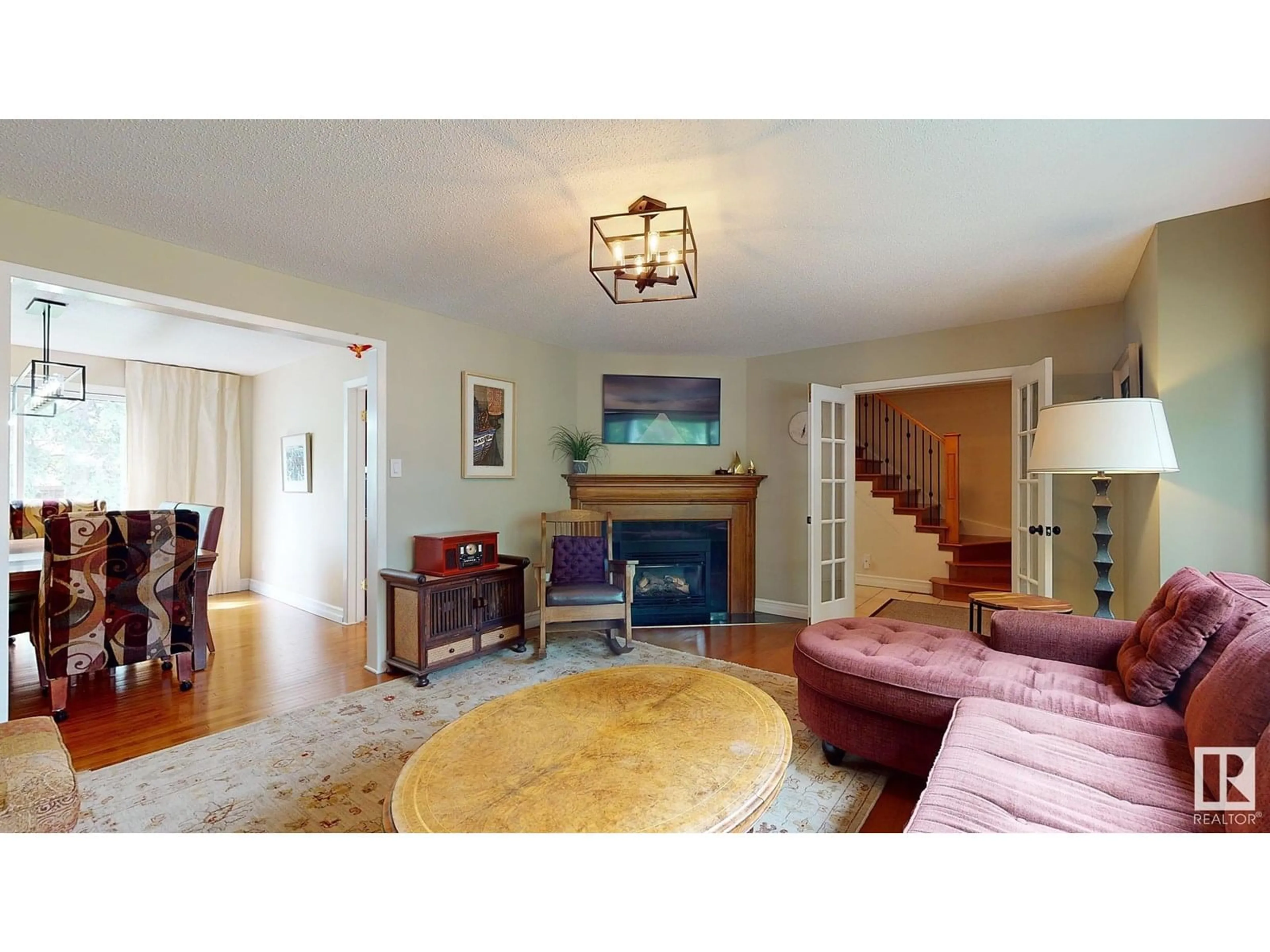 Living room with furniture, unknown for NW - 13911 88 AV, Edmonton Alberta T5R4J1