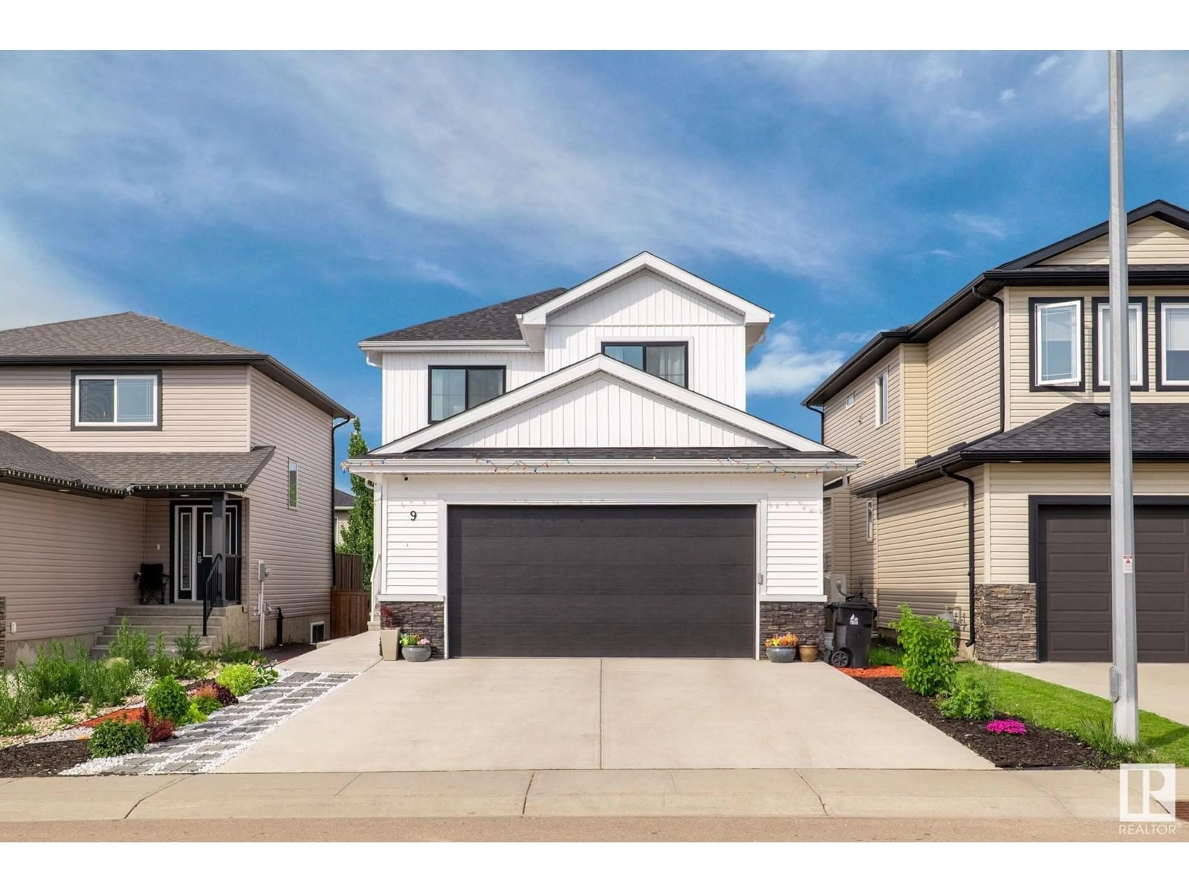 Home with vinyl exterior material, street for 9 HULL, Spruce Grove Alberta T7X4P7