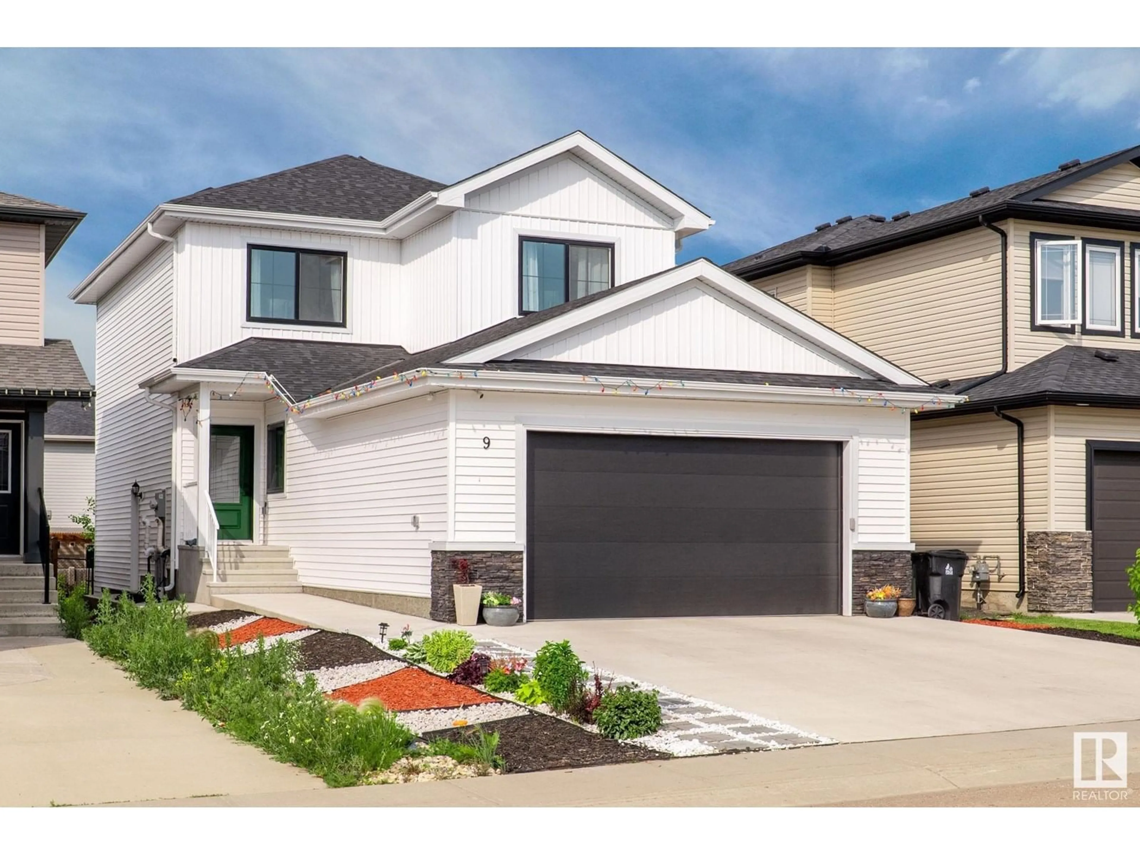 Home with vinyl exterior material, street for 9 HULL, Spruce Grove Alberta T7X4P7