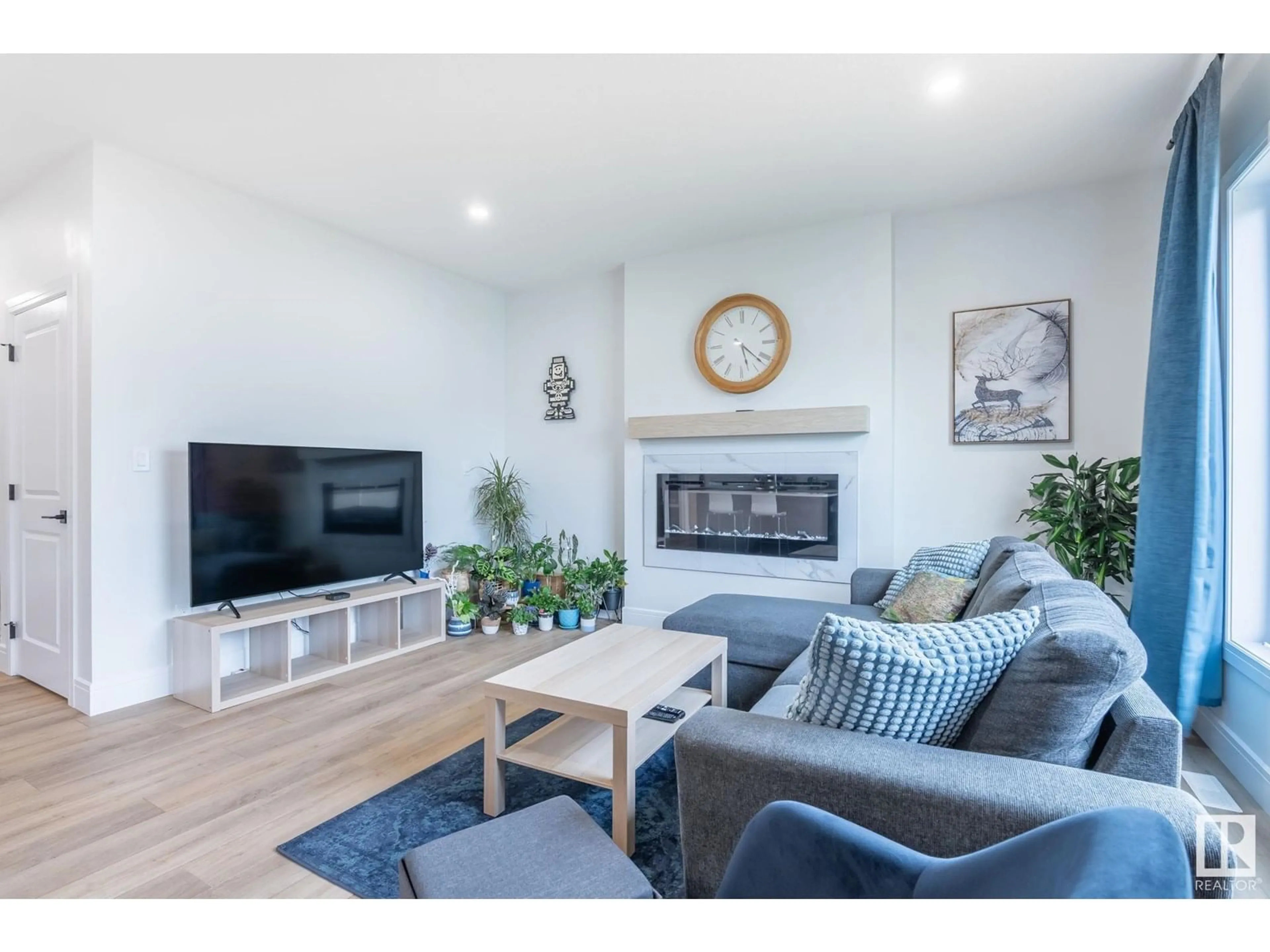 Living room with furniture, wood/laminate floor for 9 HULL, Spruce Grove Alberta T7X4P7
