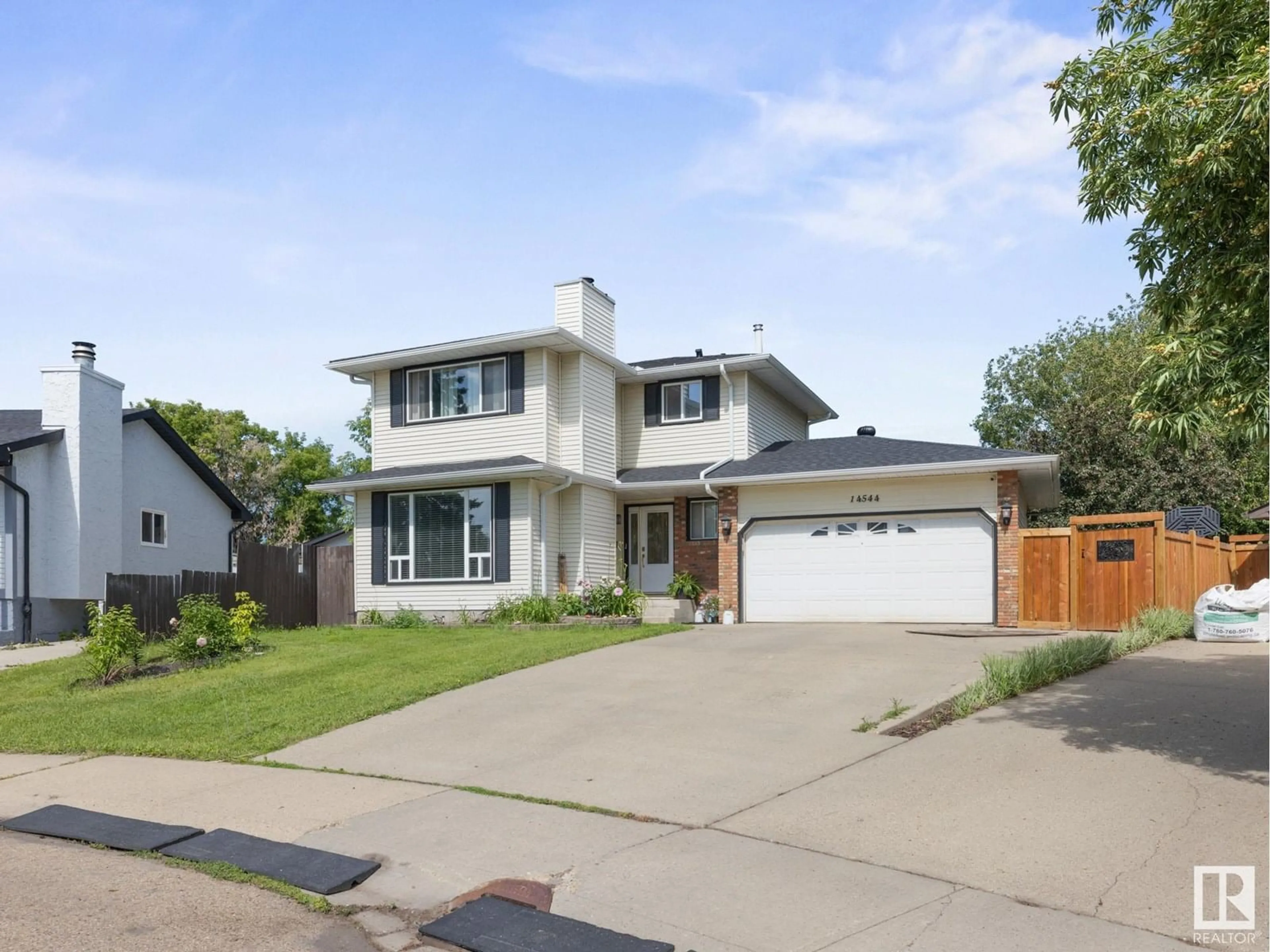 Home with brick exterior material, street for 14544 20 ST, Edmonton Alberta T5Y1V7