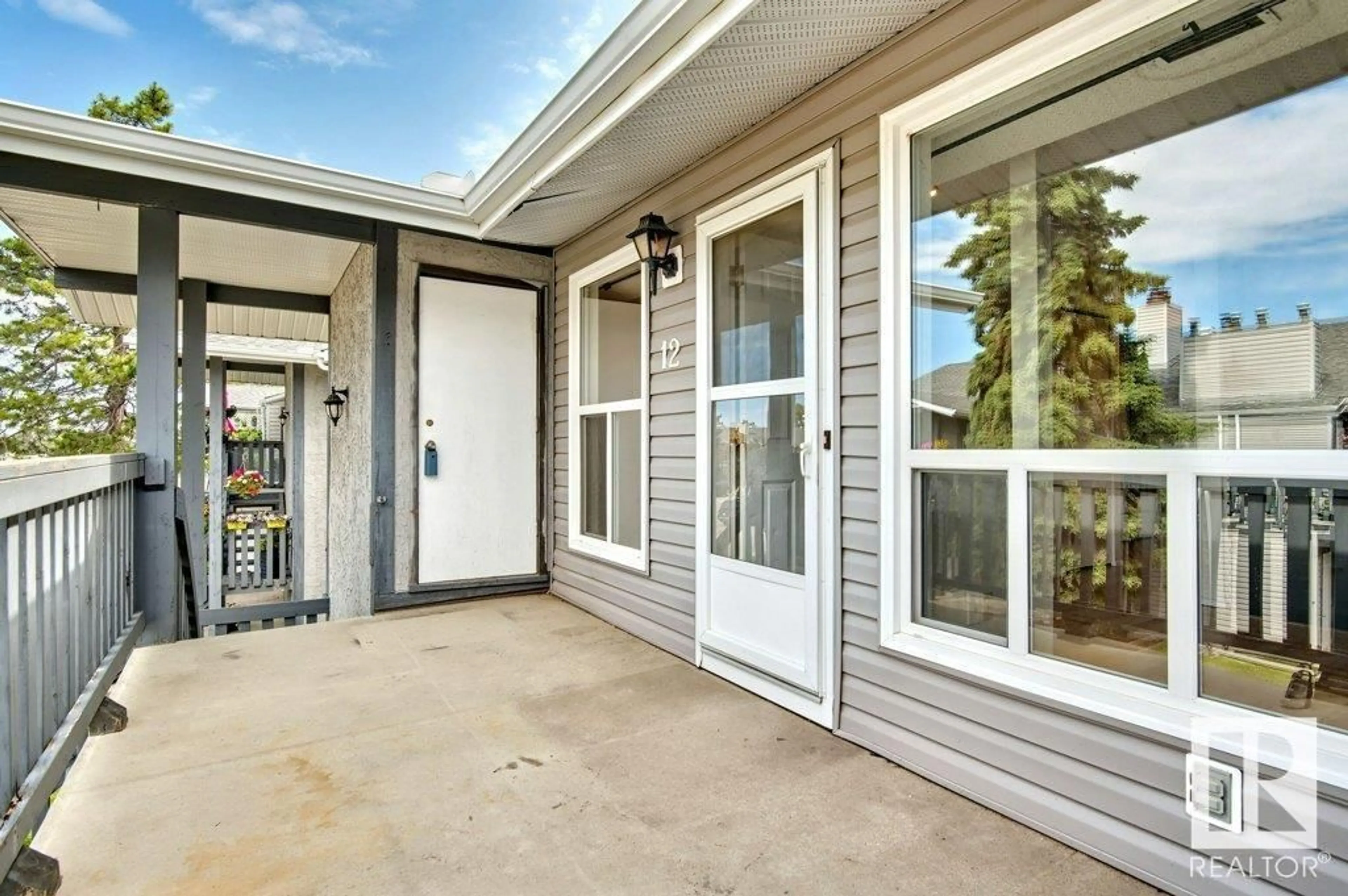 Home with vinyl exterior material, street for #12 - 1503 MILL WOODS E, Edmonton Alberta T6L4C2