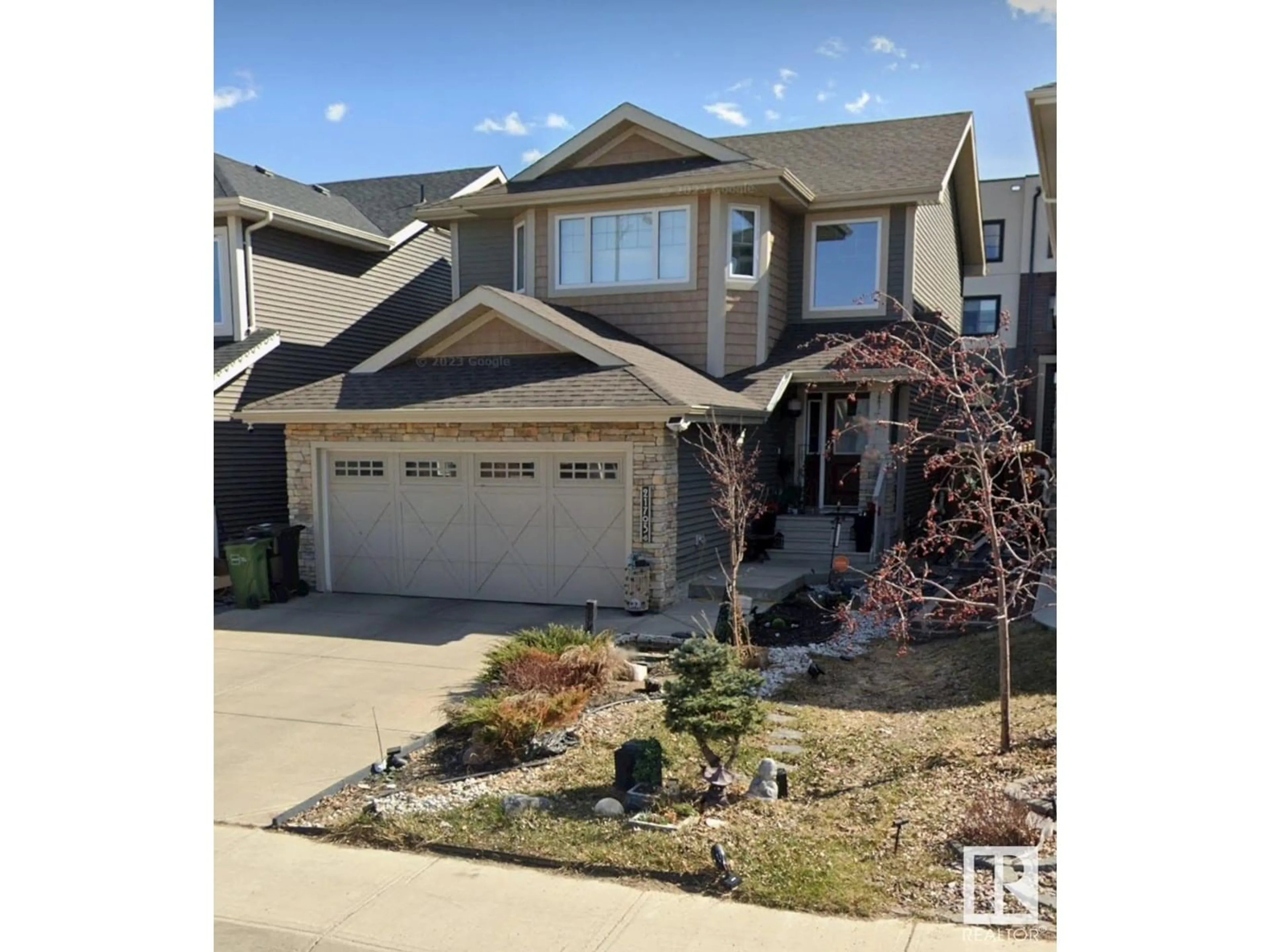 Home with vinyl exterior material, street for 21703 84 AV, Edmonton Alberta T5T4W2