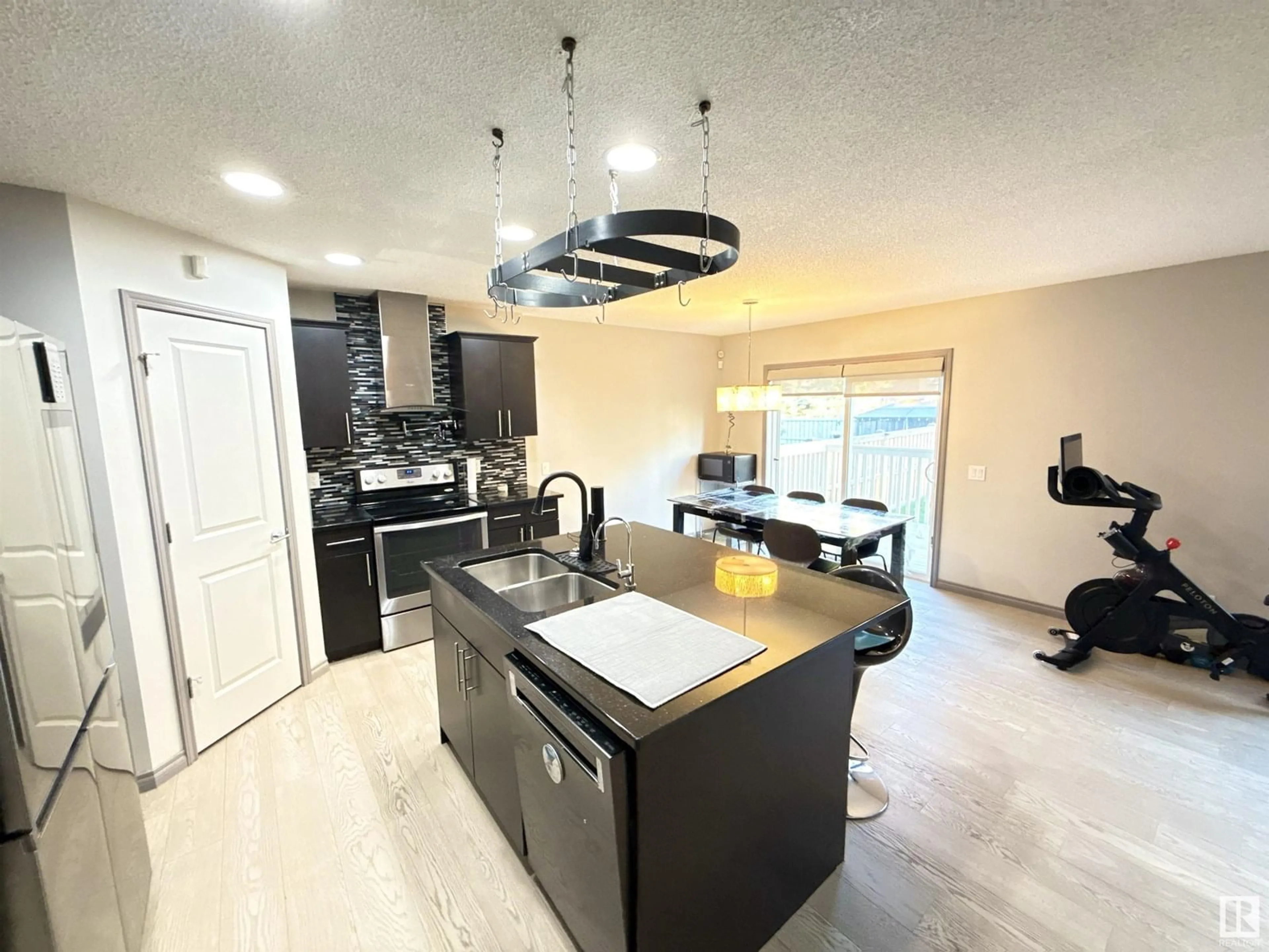 Open concept kitchen, unknown for 21703 84 AV, Edmonton Alberta T5T4W2