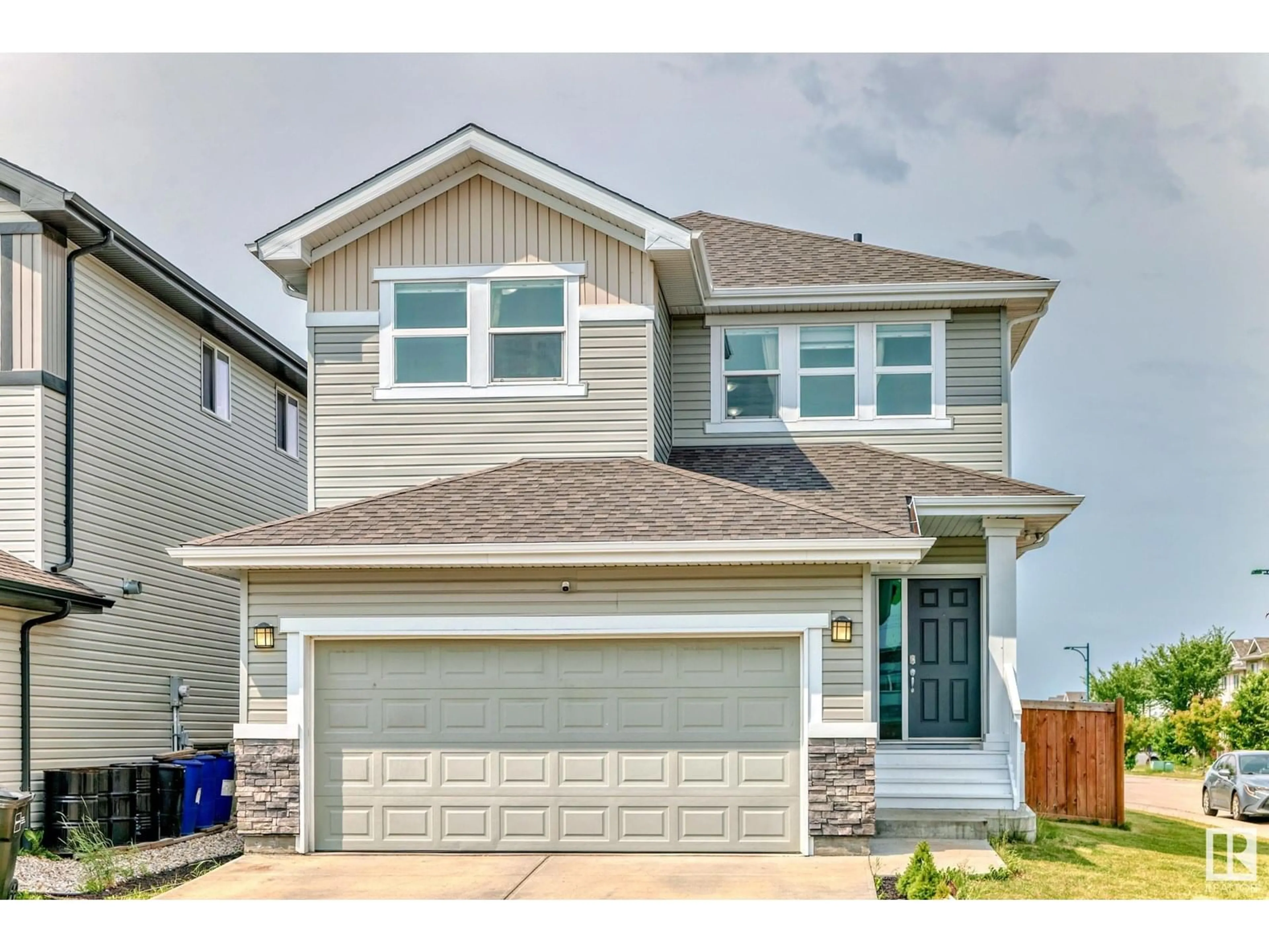 Home with vinyl exterior material, street for NW - 1452 30 ST, Edmonton Alberta T6T0Z5