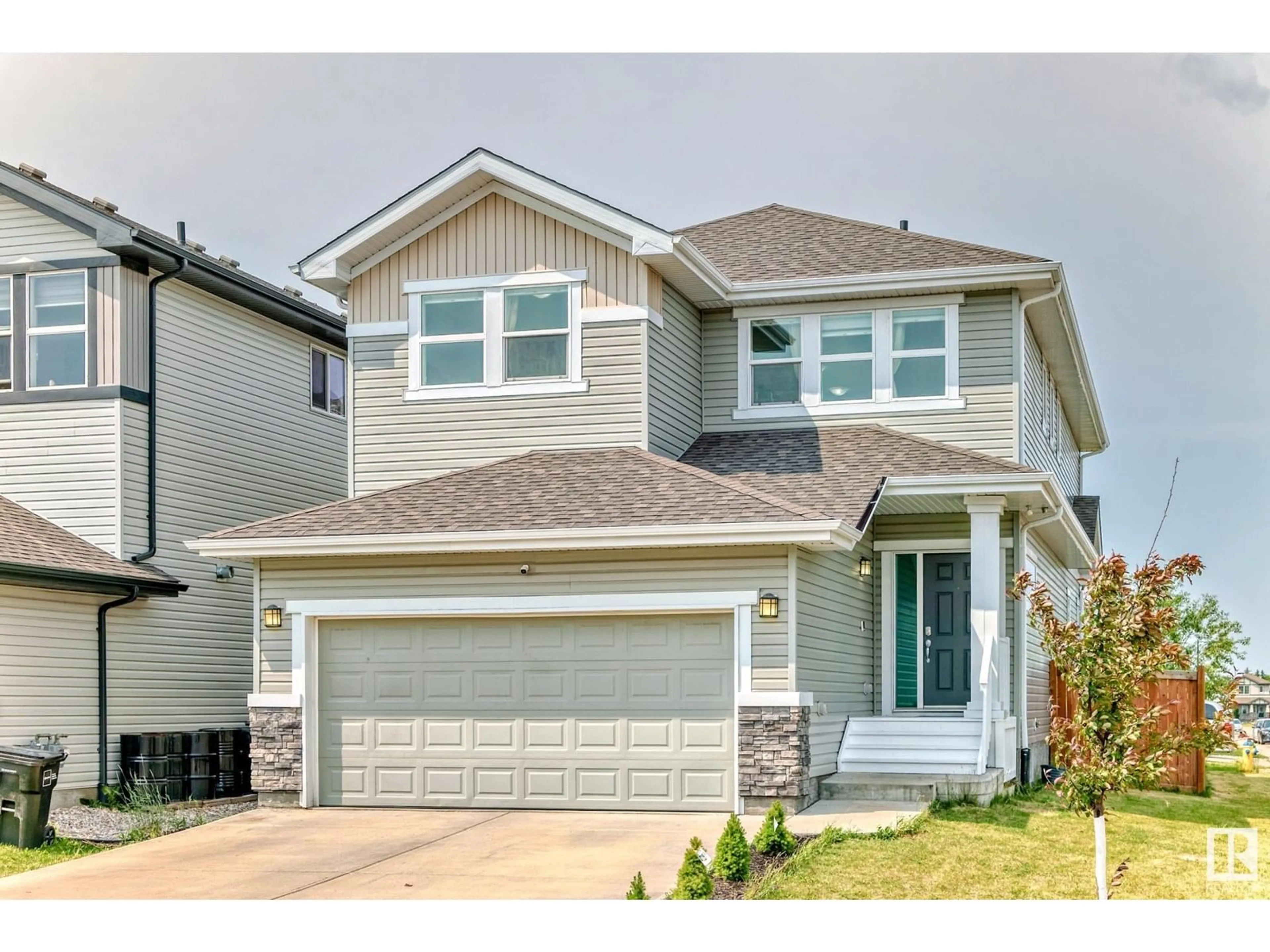 Home with vinyl exterior material, street for NW - 1452 30 ST, Edmonton Alberta T6T0Z5