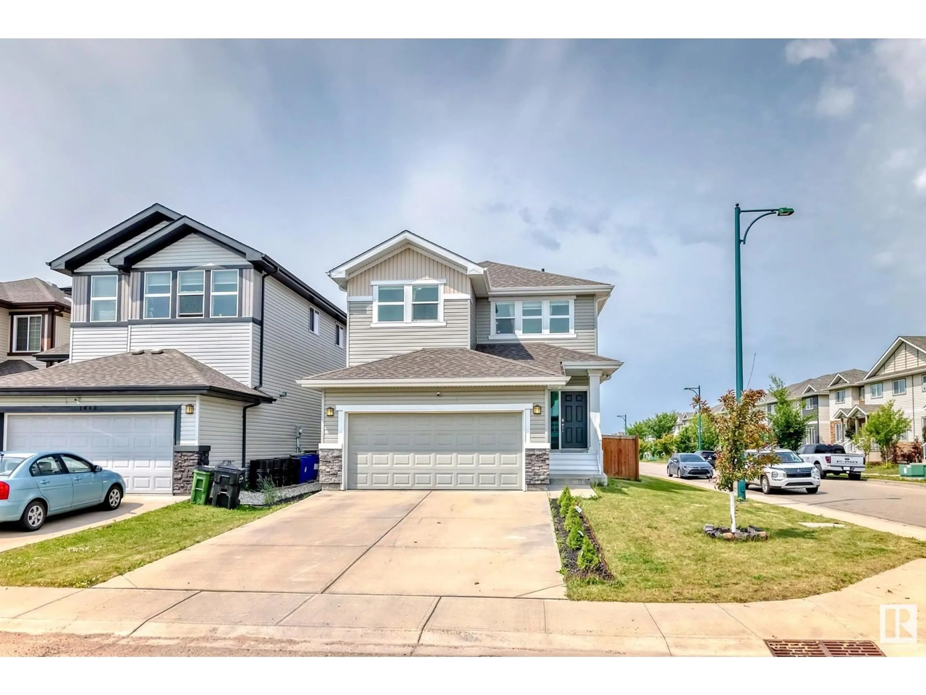 Home with vinyl exterior material, street for NW - 1452 30 ST, Edmonton Alberta T6T0Z5