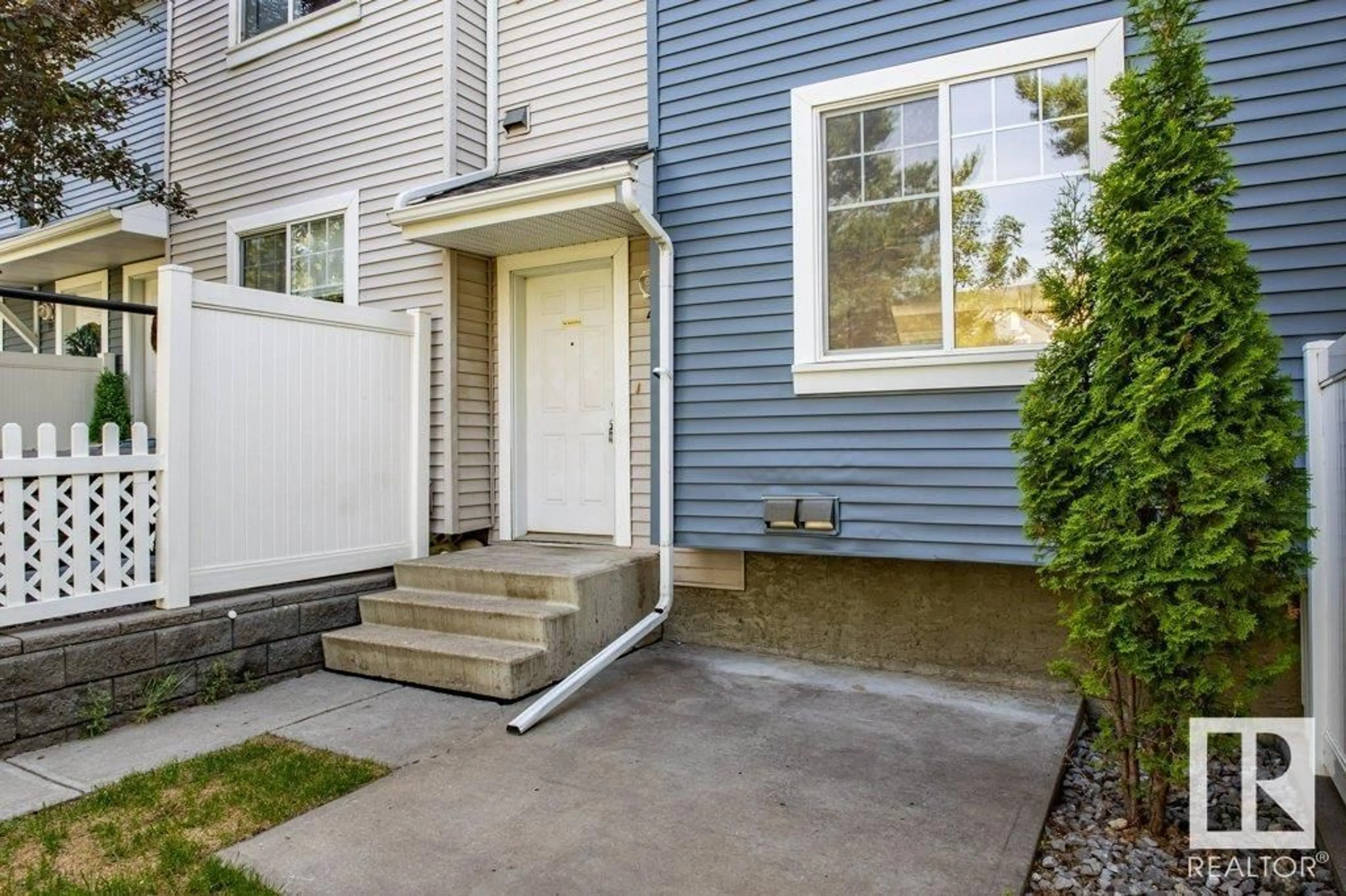 Home with vinyl exterior material, street for #41 - 8304 11 AV, Edmonton Alberta T6X1J8