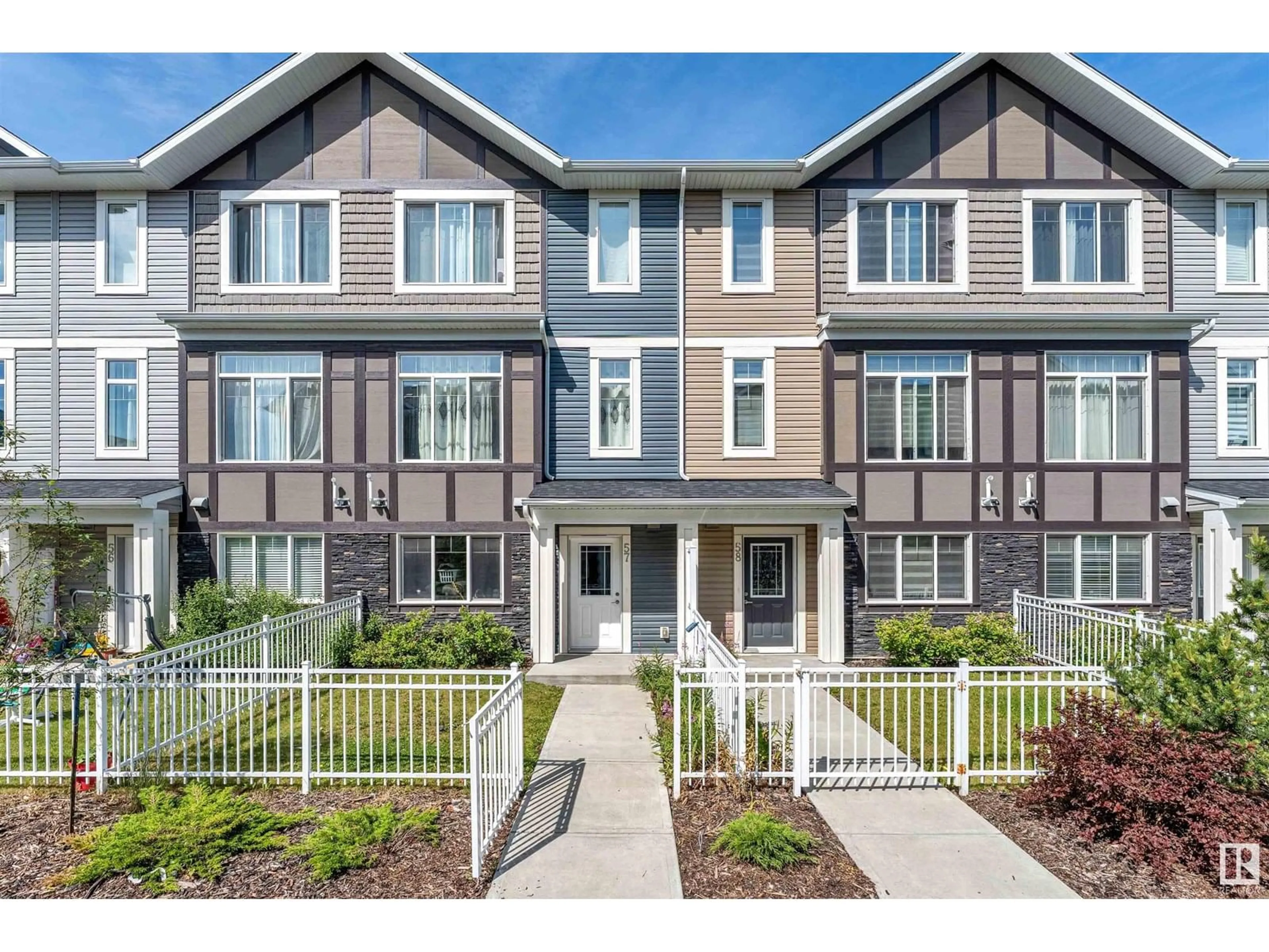 Home with vinyl exterior material, street for #57 - 2215 24 ST NW, Edmonton Alberta T6T1A6
