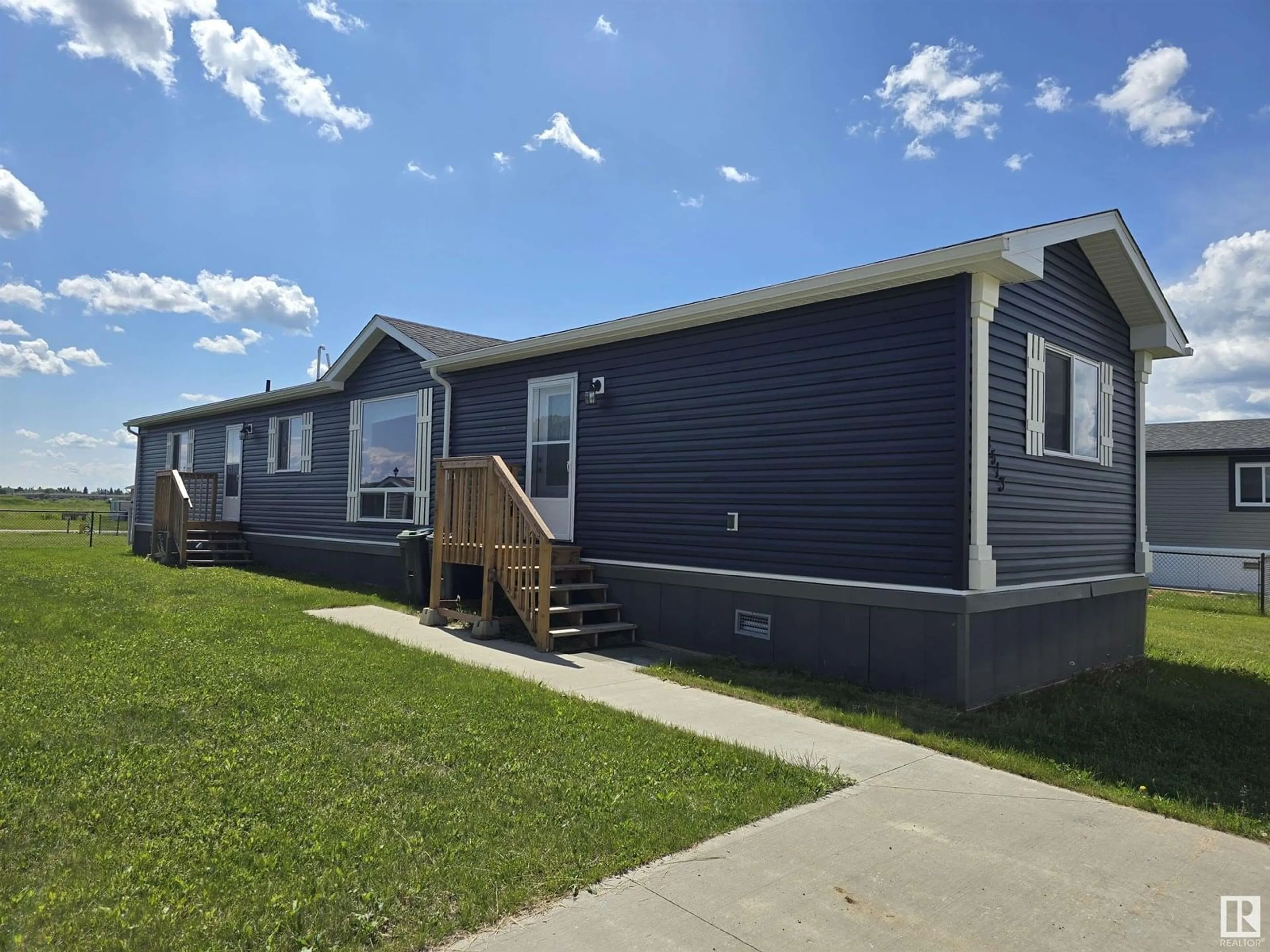 Home with vinyl exterior material, street for 4513 SNOWBIRD LN, Cold Lake Alberta T9M0C6
