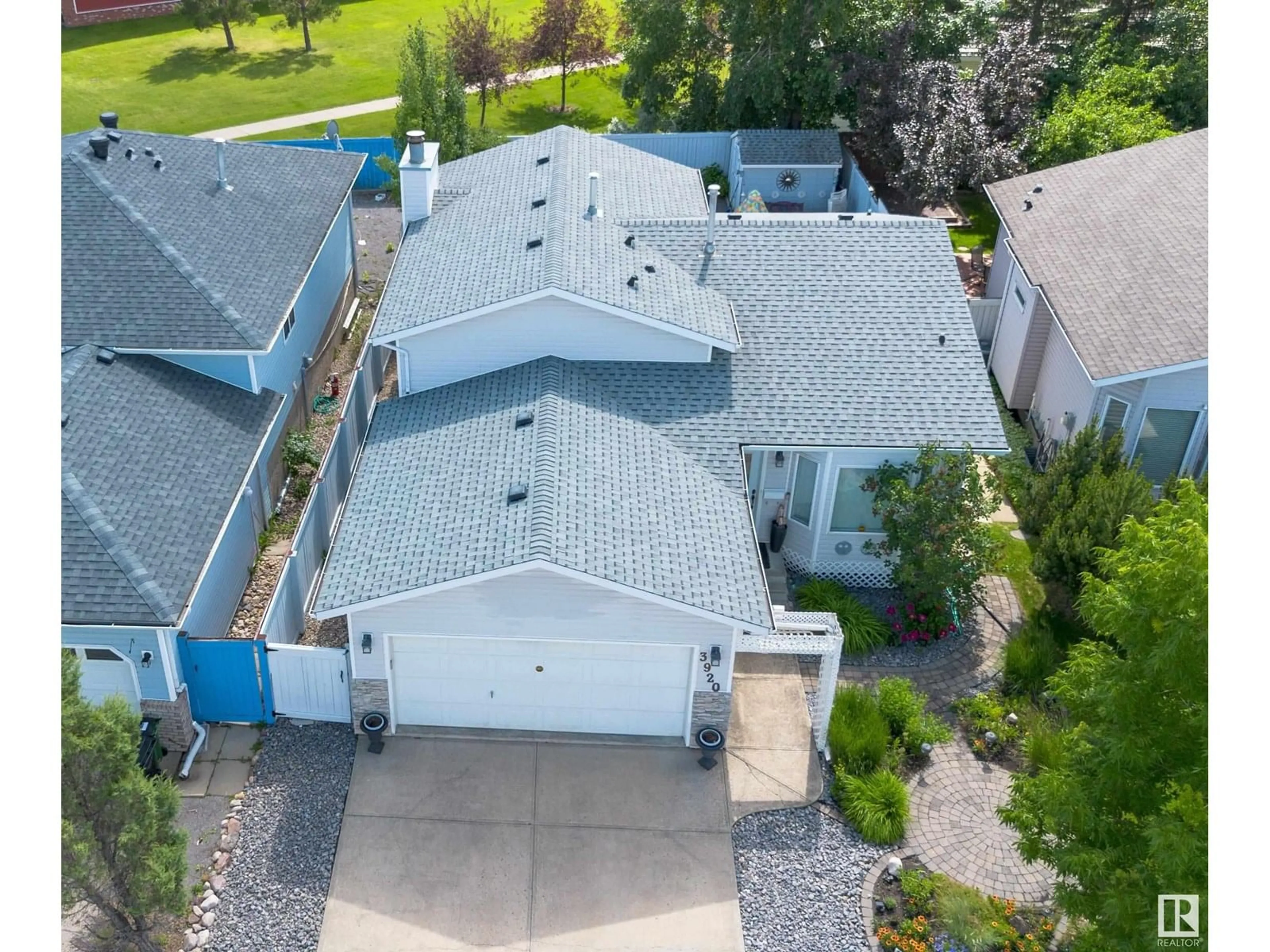 A pic from outside/outdoor area/front of a property/back of a property/a pic from drone, street for 3920 33 NW, Edmonton Alberta T6T1J7