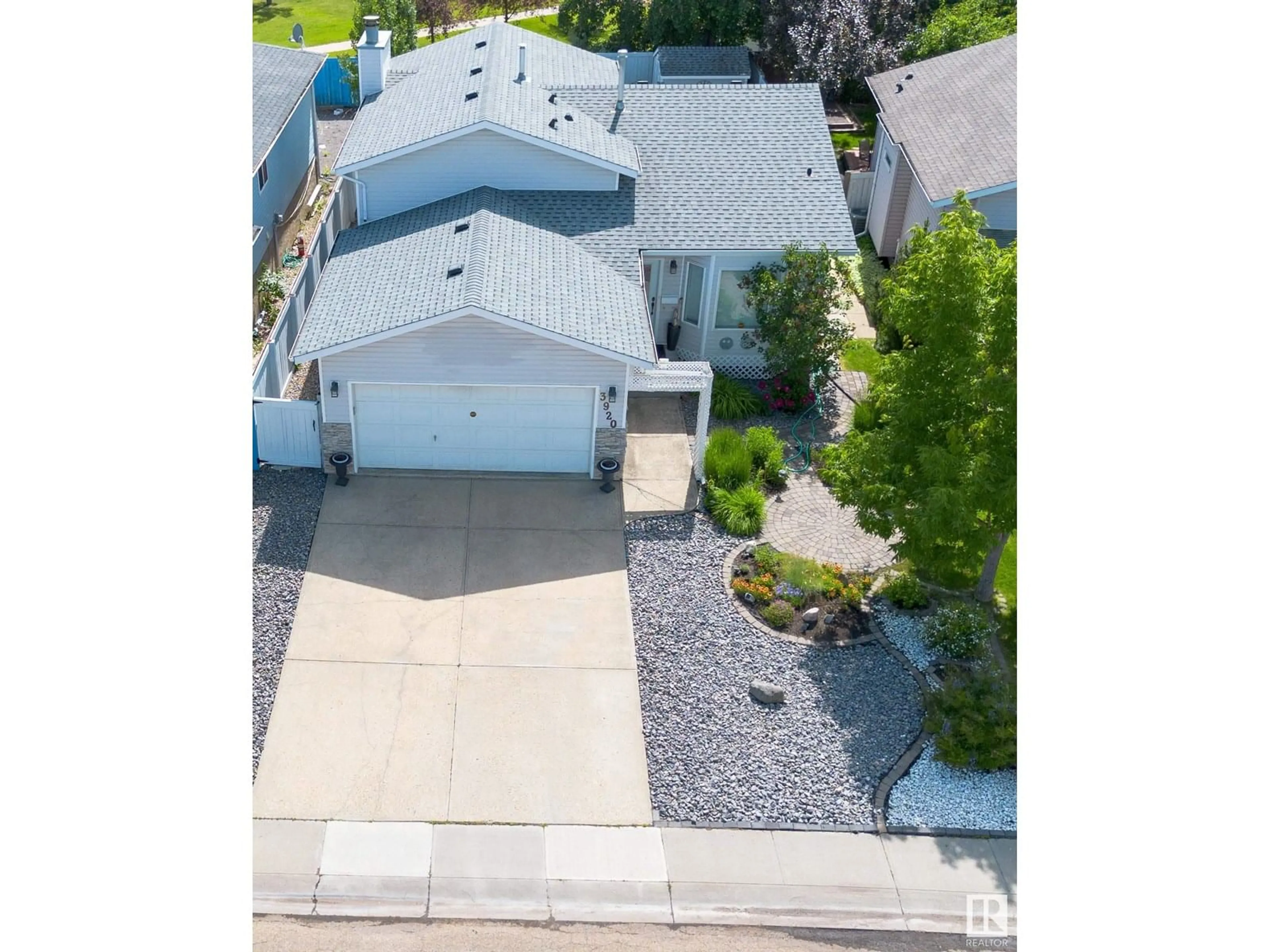 A pic from outside/outdoor area/front of a property/back of a property/a pic from drone, street for 3920 33 NW, Edmonton Alberta T6T1J7