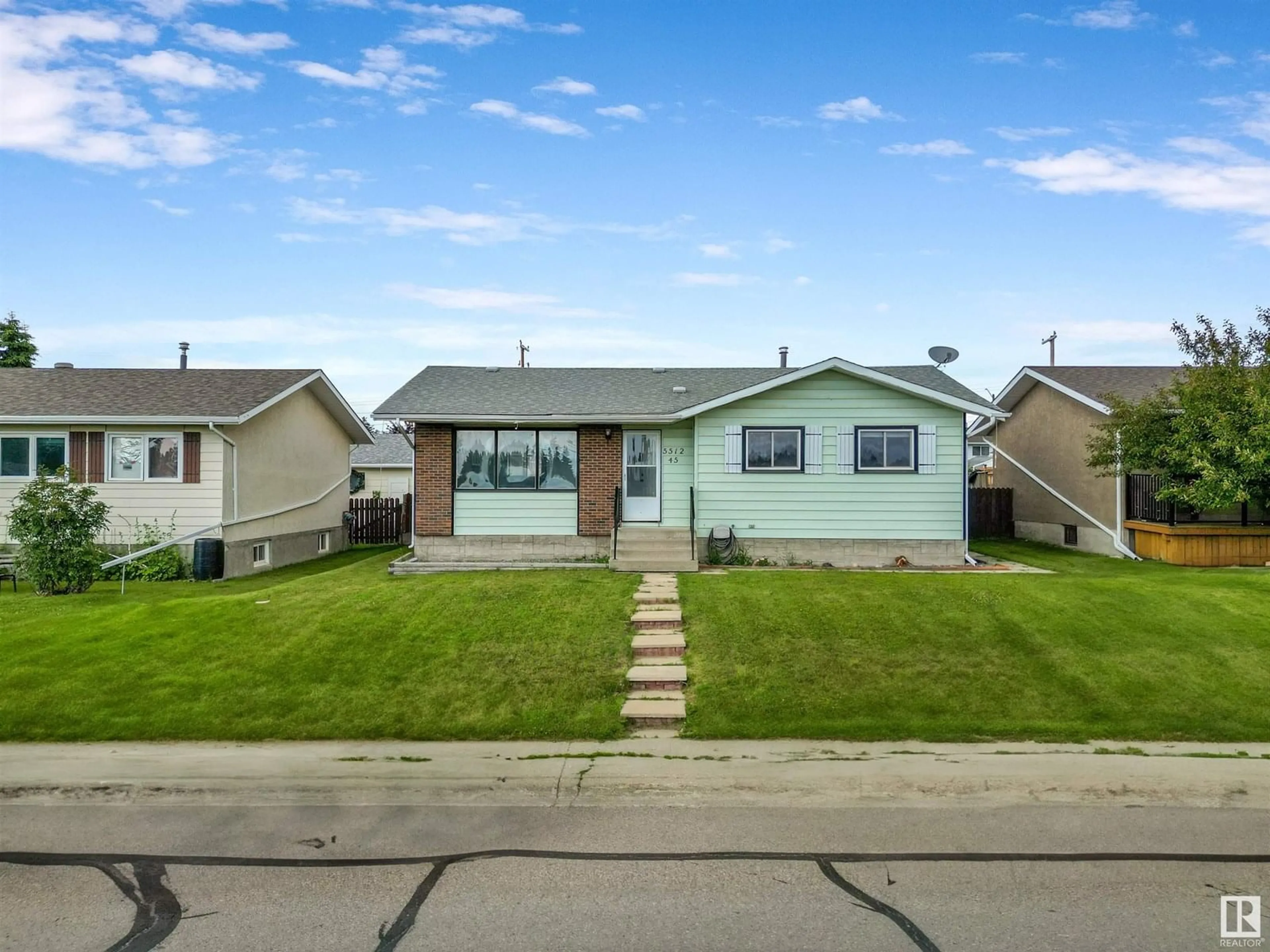 Home with vinyl exterior material, street for 5512 45 AVENUE, Drayton Valley Alberta T7A1K3