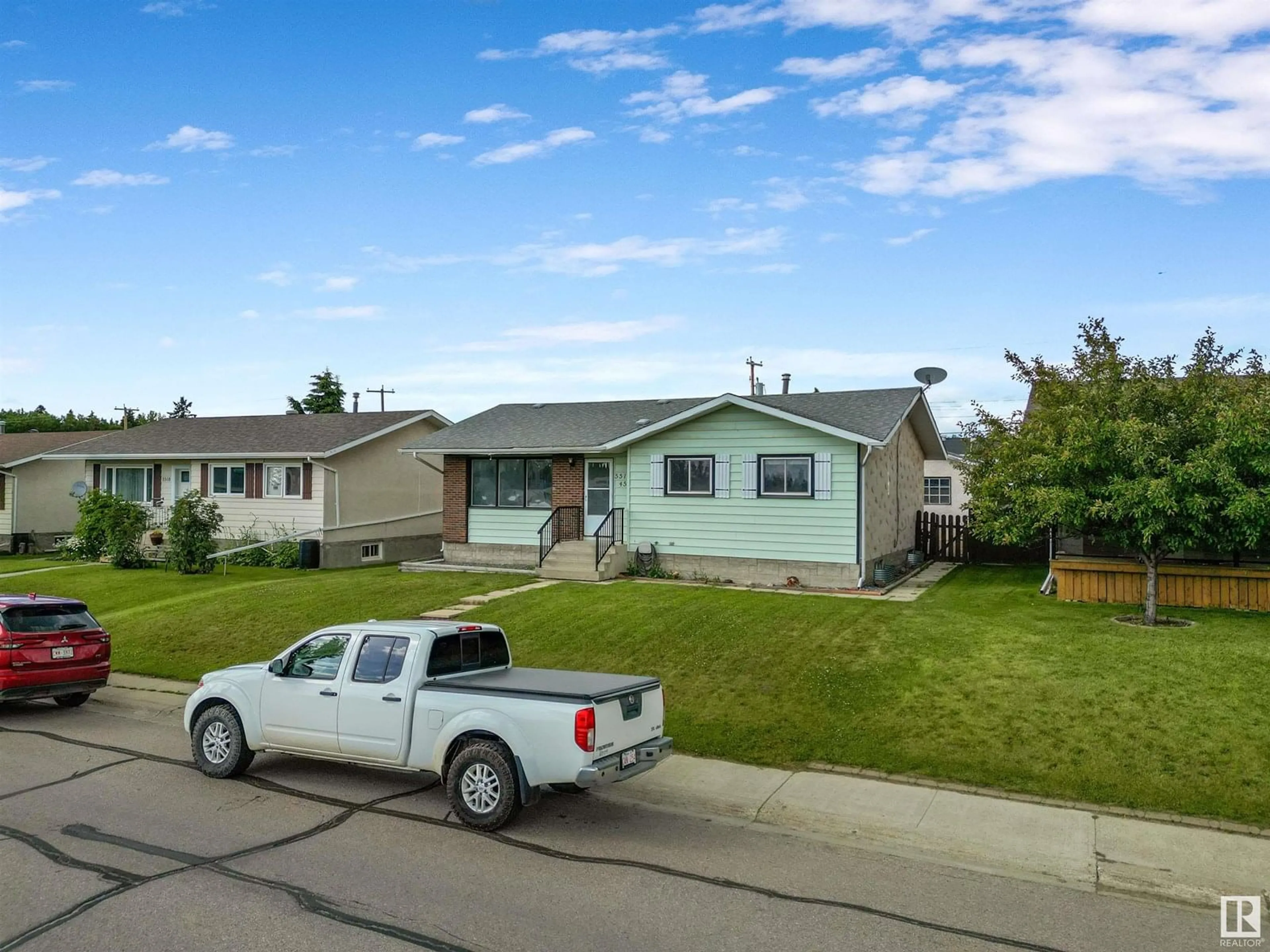 Home with vinyl exterior material, street for 5512 45 AVENUE, Drayton Valley Alberta T7A1K3