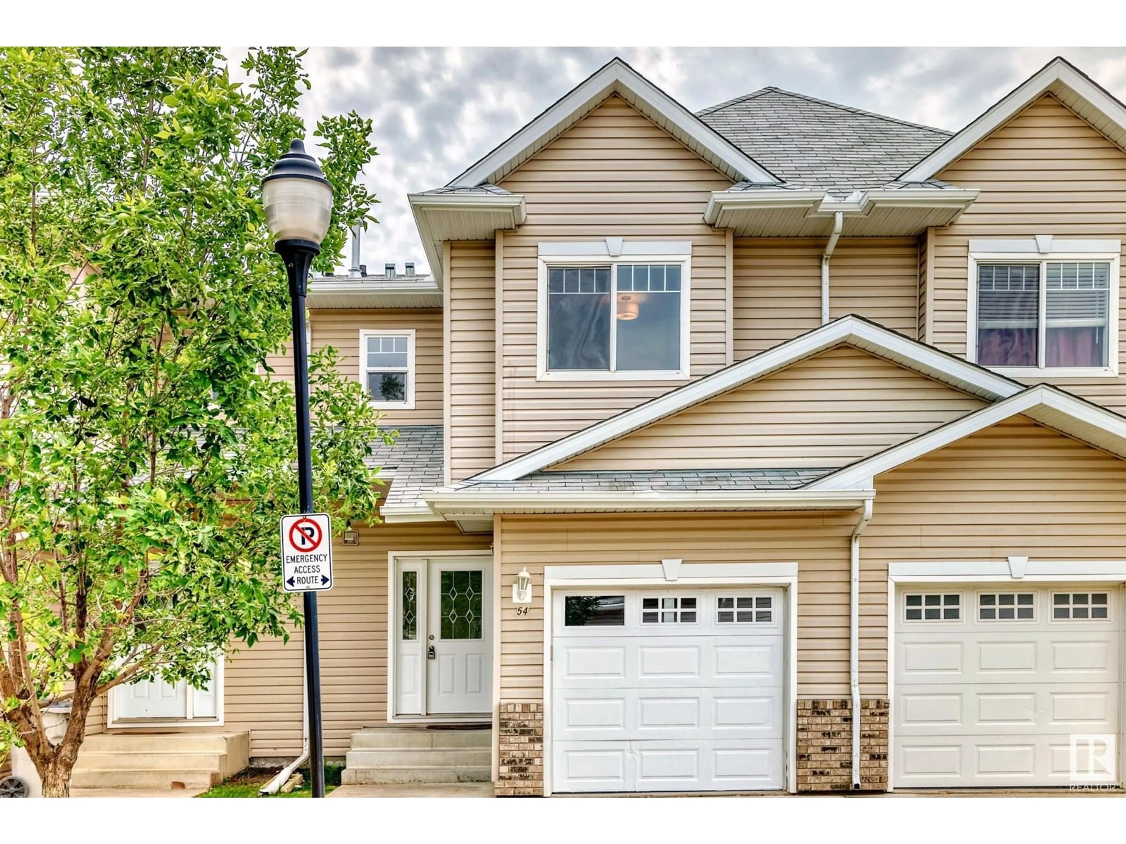 Home with vinyl exterior material, street for #54 - 5001 62 ST, Beaumont Alberta T4X1T6
