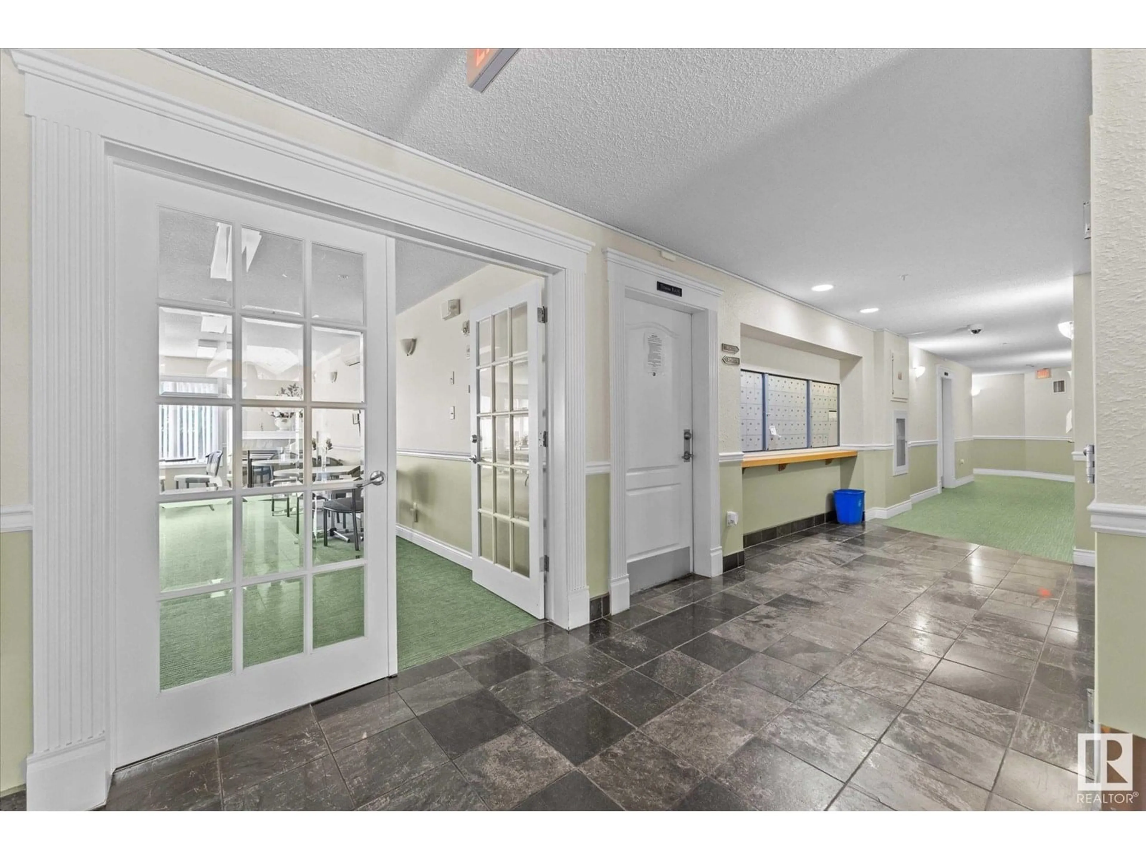 Indoor foyer for 110 - 110 2420 108 ST NW, Edmonton Alberta T6J7J3