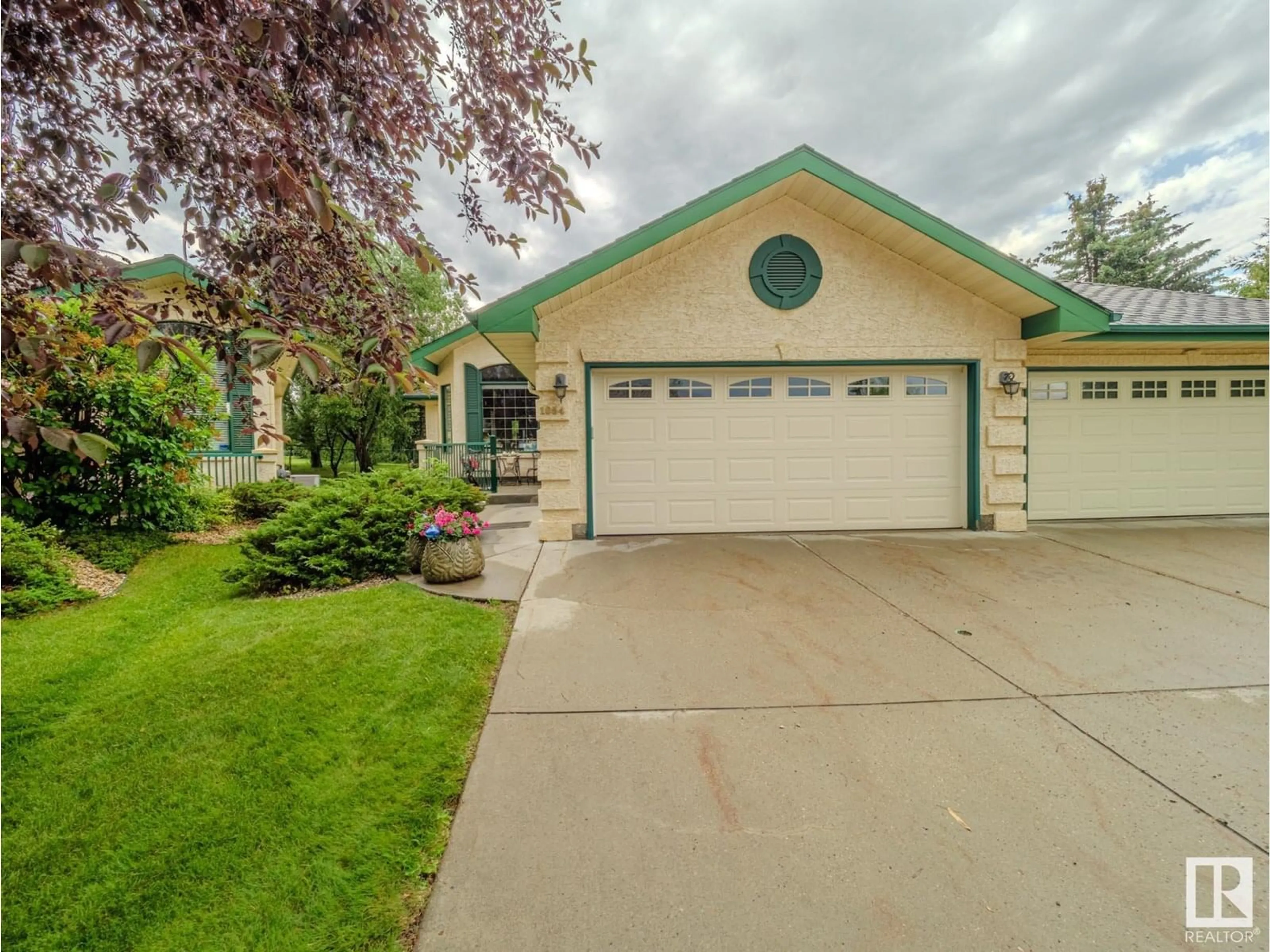 Home with vinyl exterior material, street for 1054 CARTER CREST RD, Edmonton Alberta T6R2K2