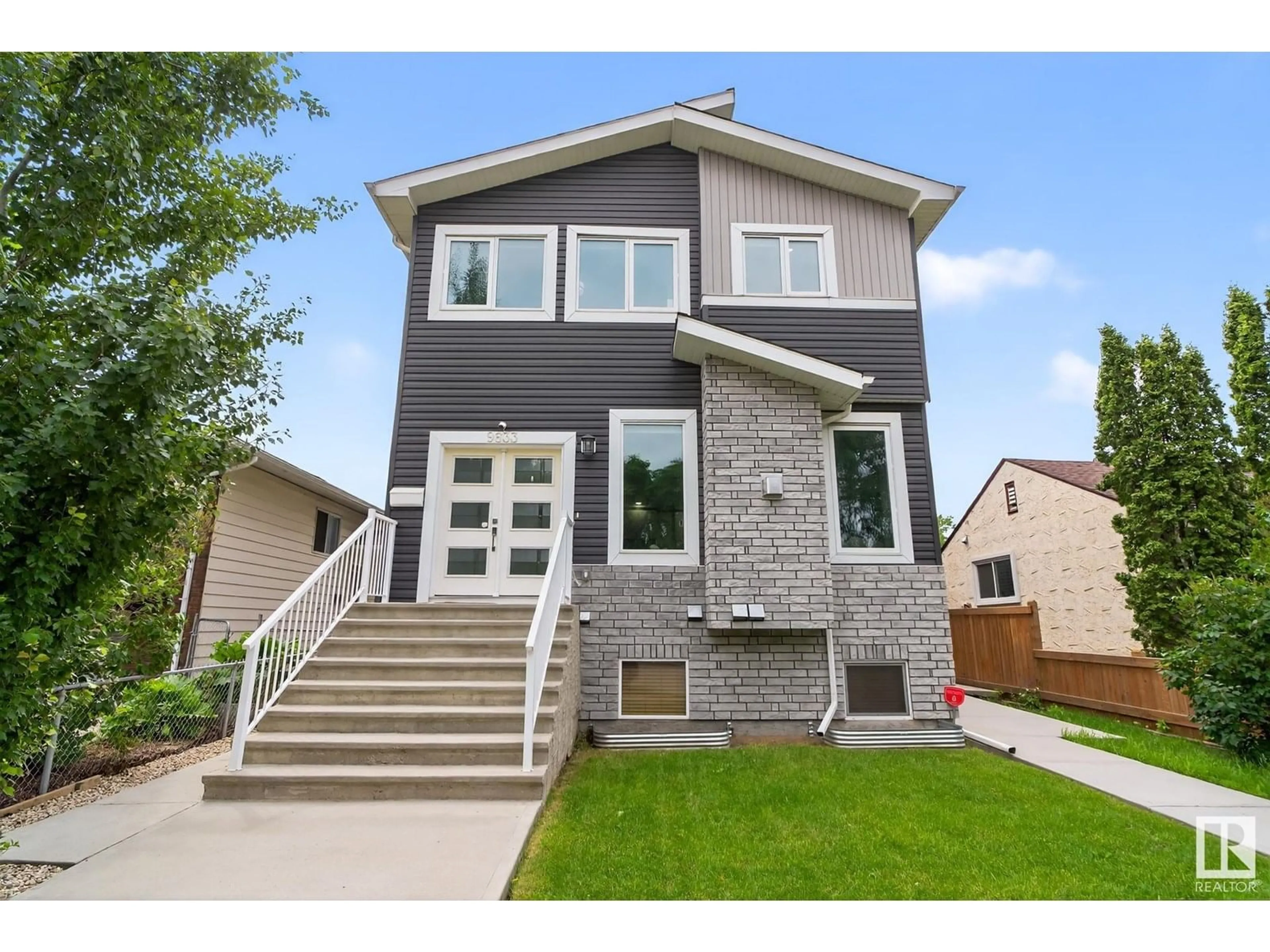 Home with brick exterior material, street for 9833 76 AV, Edmonton Alberta T6E1K6