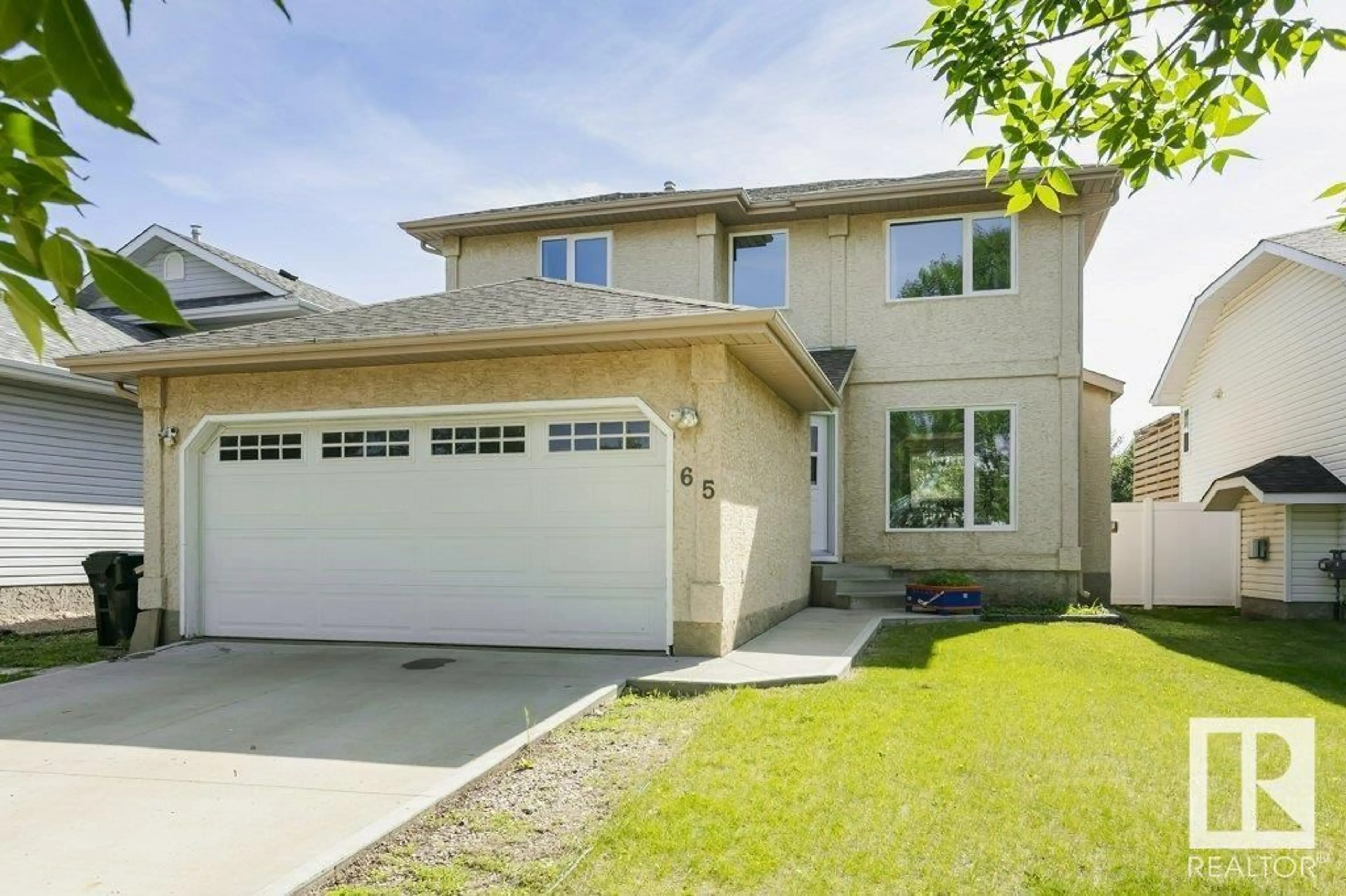 Home with vinyl exterior material, street for 65 DALTON WY, Sherwood Park Alberta T8H1T6
