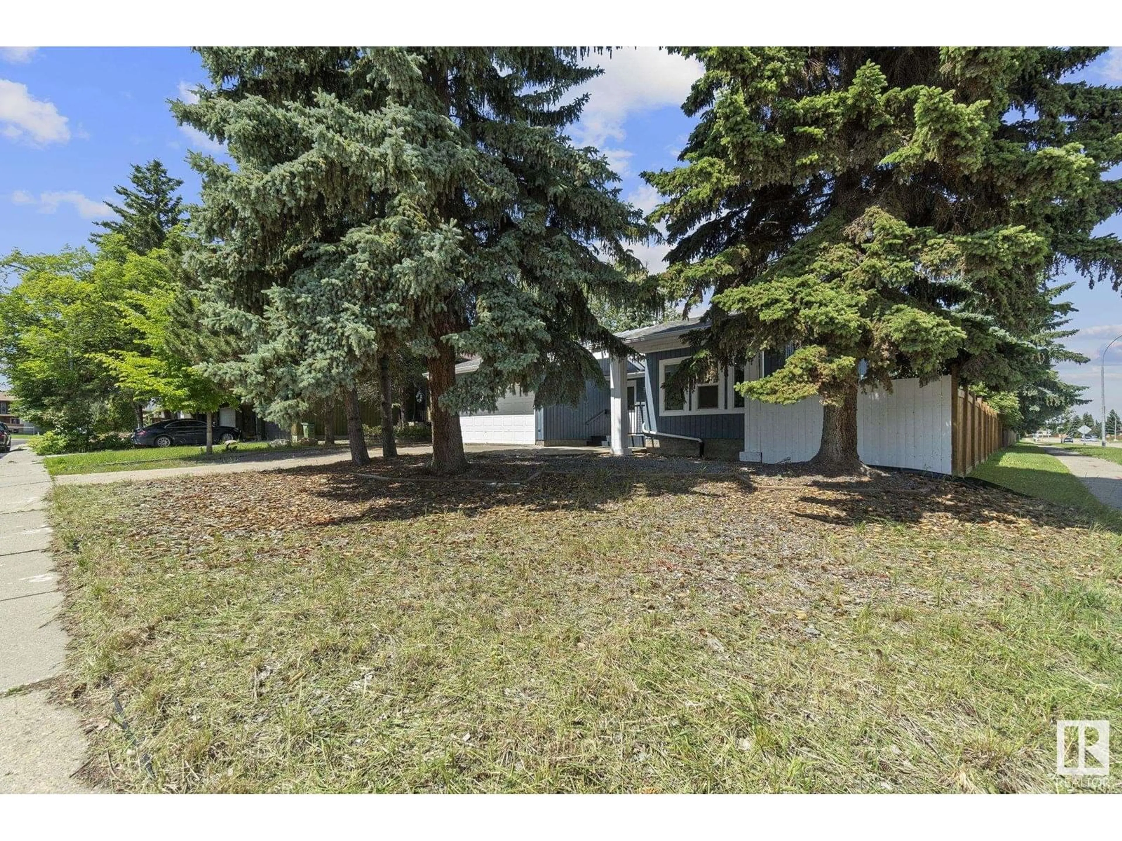 A pic from outside/outdoor area/front of a property/back of a property/a pic from drone, street for 18404 66 AV, Edmonton Alberta T5T2M2