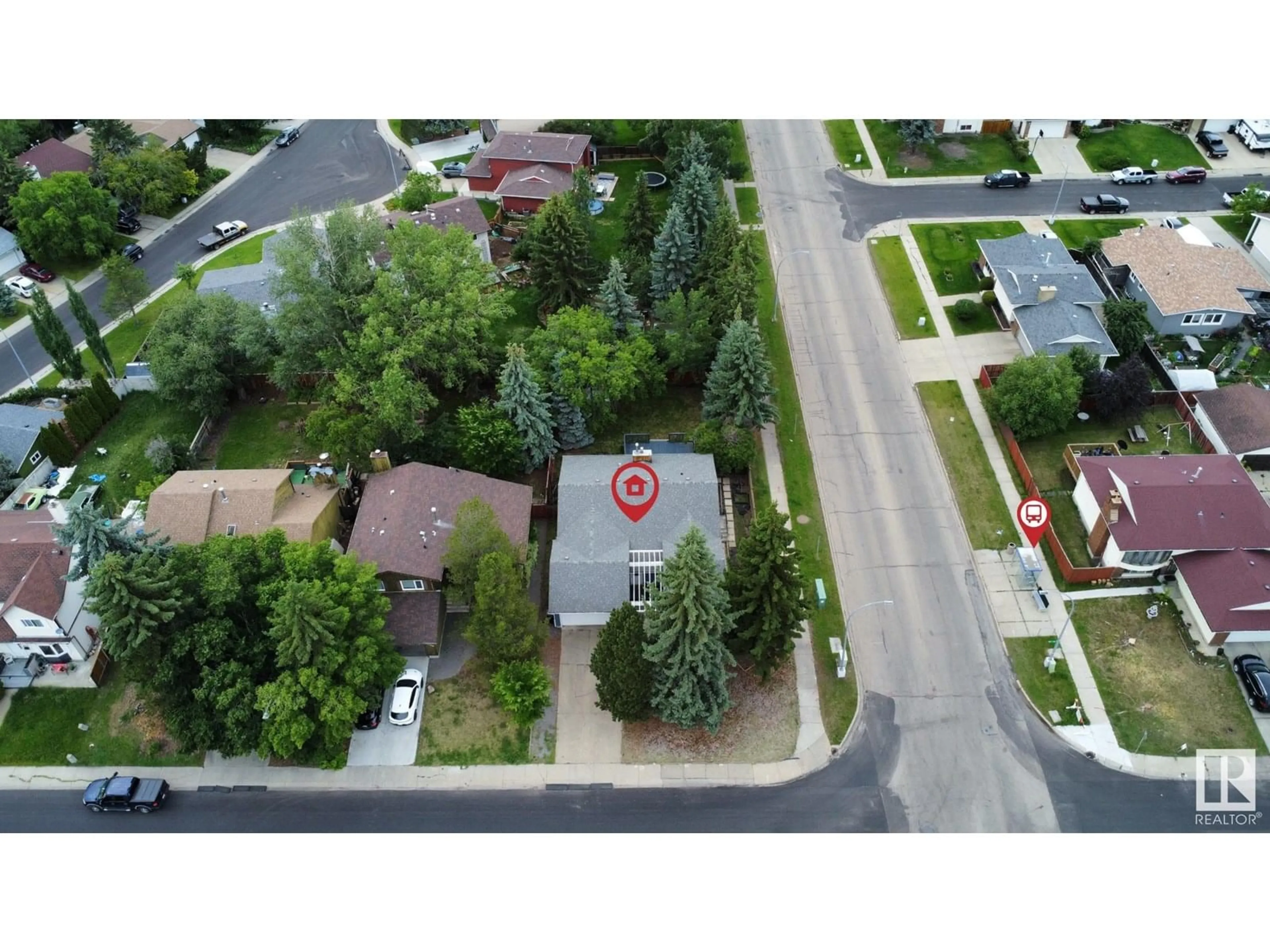 A pic from outside/outdoor area/front of a property/back of a property/a pic from drone, street for 18404 66 AV, Edmonton Alberta T5T2M2