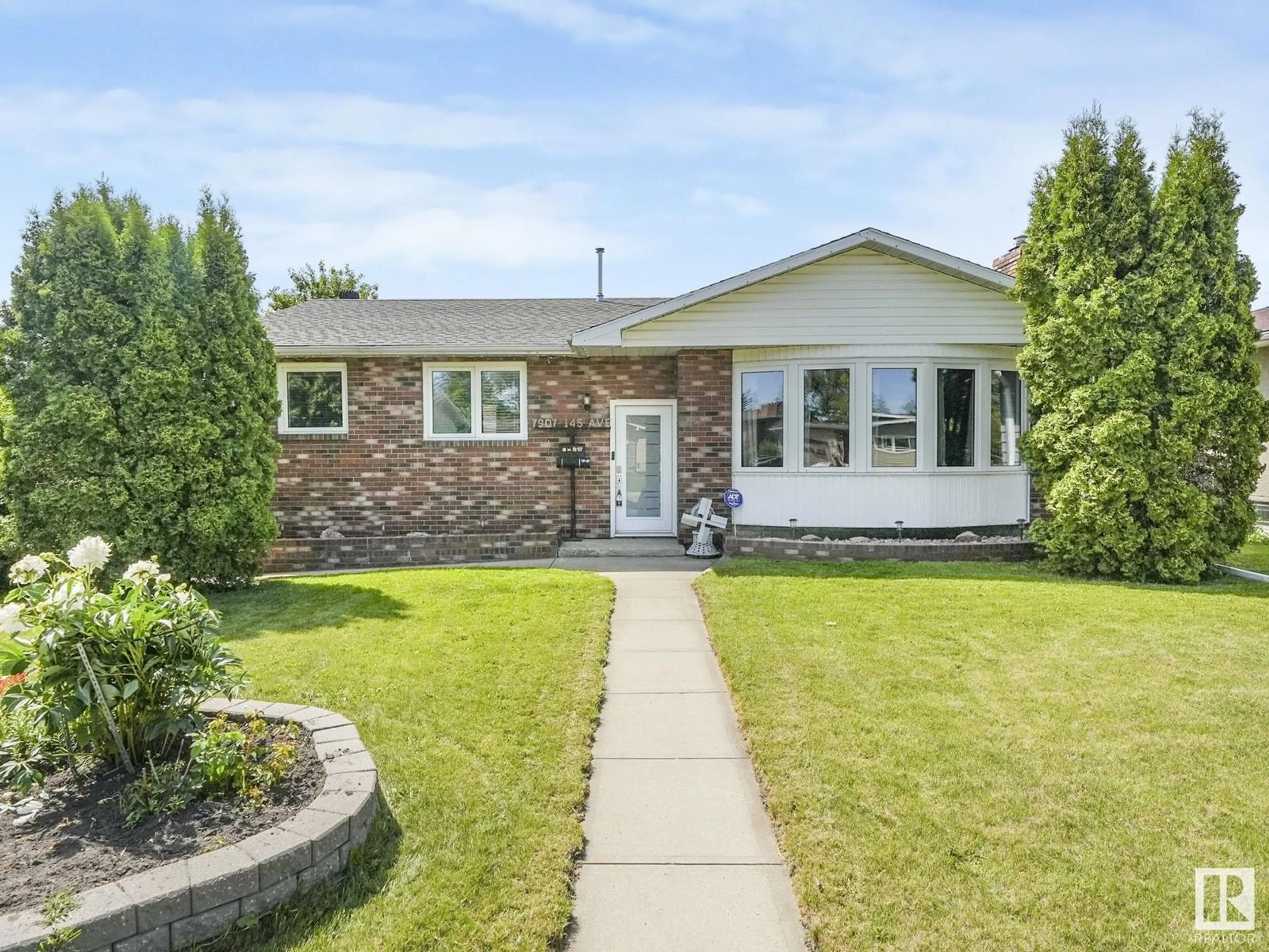 Home with brick exterior material, street for 7907 145 AV, Edmonton Alberta T5C2S8