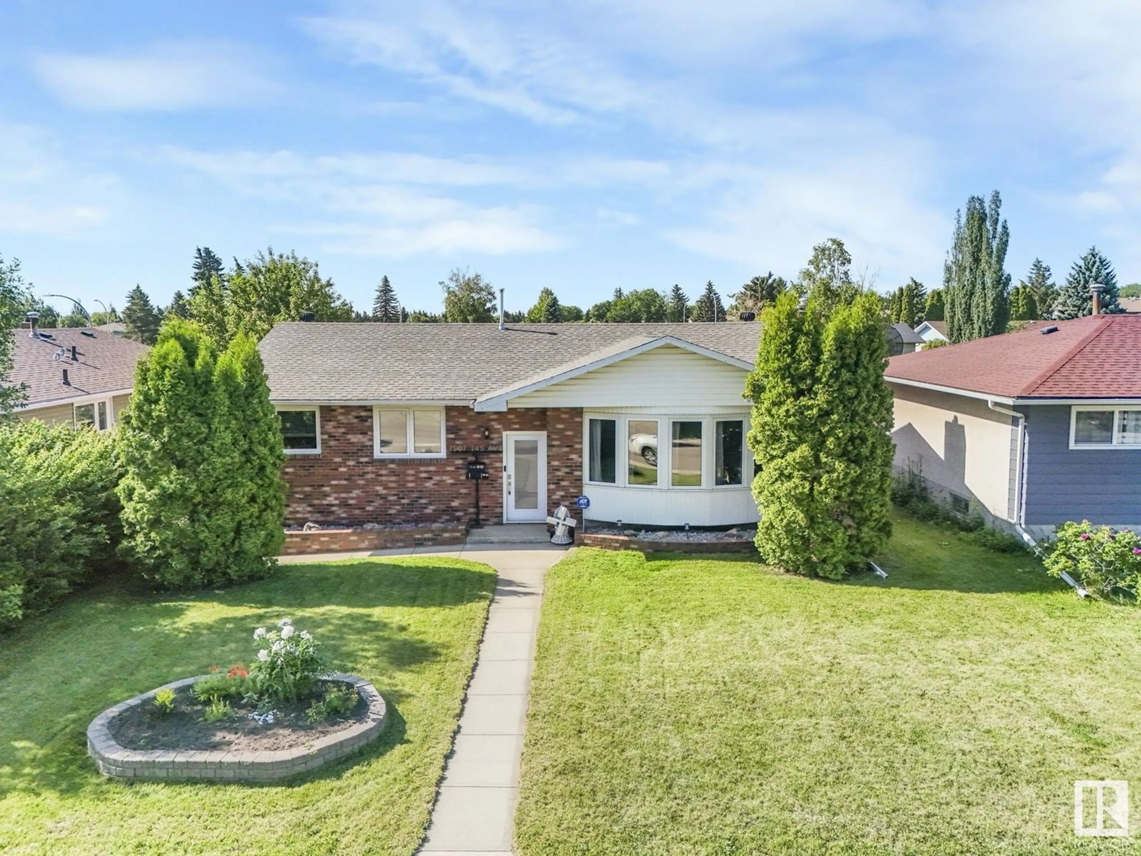 A pic from outside/outdoor area/front of a property/back of a property/a pic from drone, street for 7907 145 AV, Edmonton Alberta T5C2S8