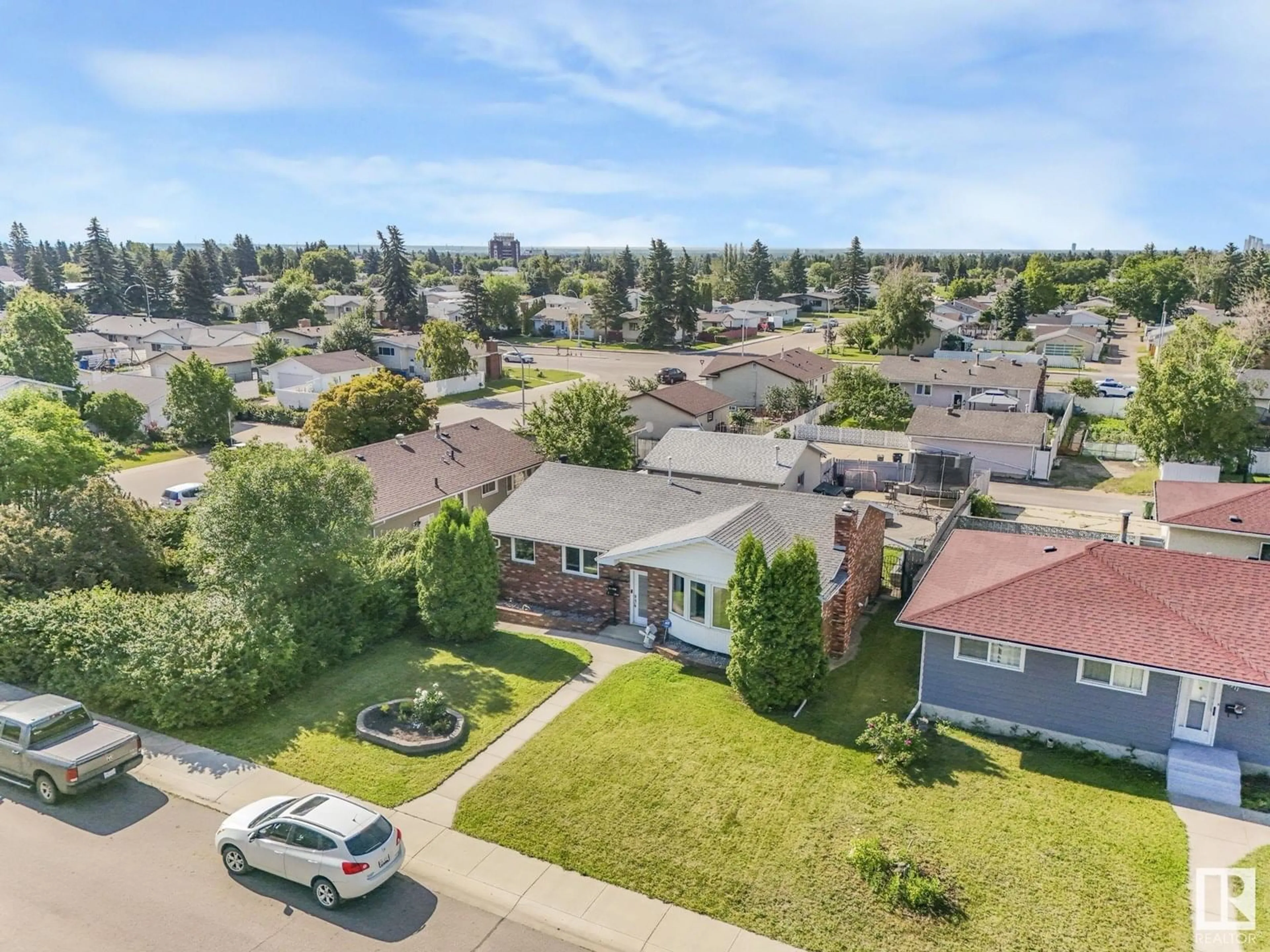 A pic from outside/outdoor area/front of a property/back of a property/a pic from drone, street for 7907 145 AV, Edmonton Alberta T5C2S8