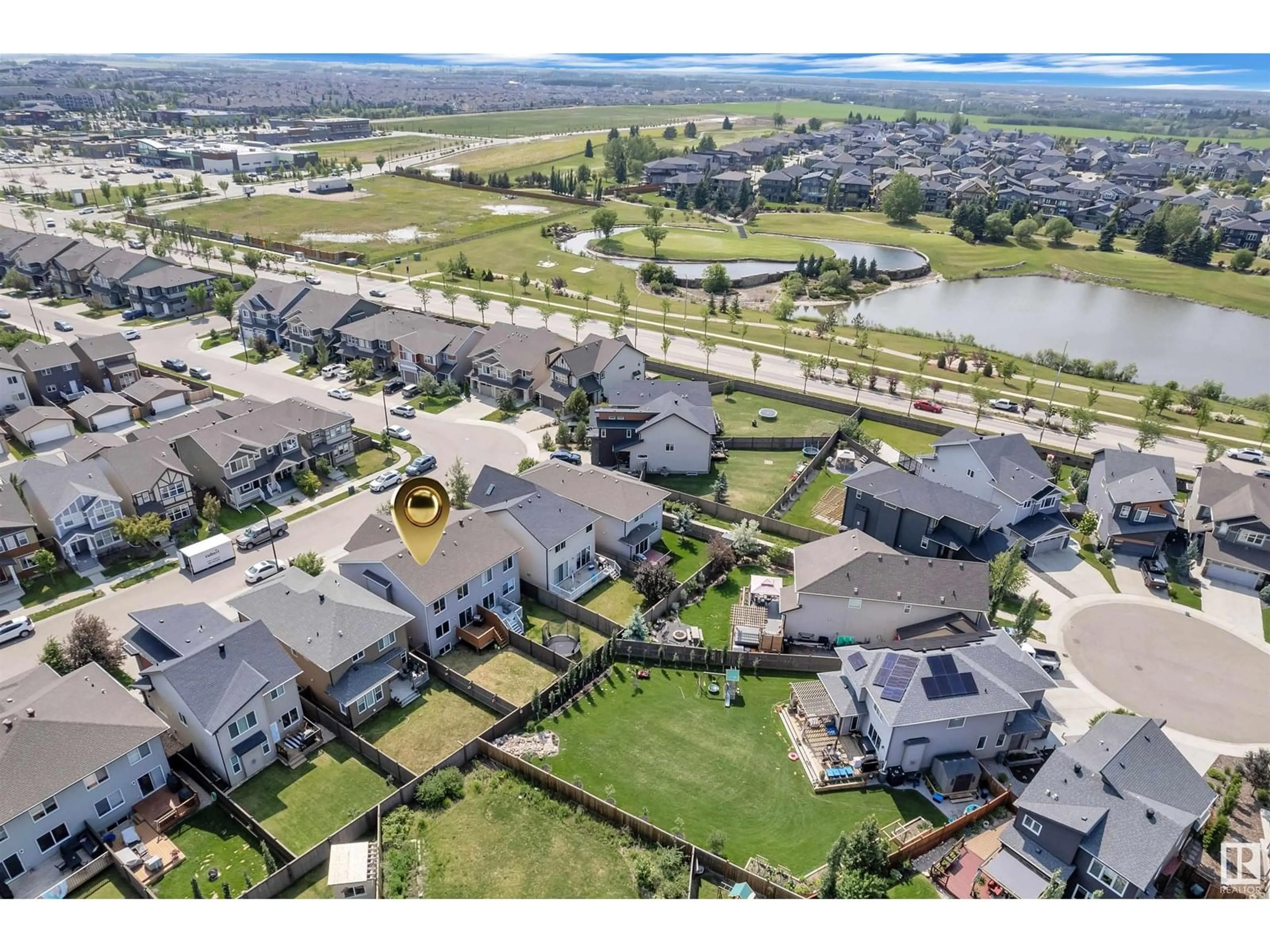 A pic from outside/outdoor area/front of a property/back of a property/a pic from drone, water/lake/river/ocean view for SW - 3832 POWELL WD, Edmonton Alberta T6W2V4