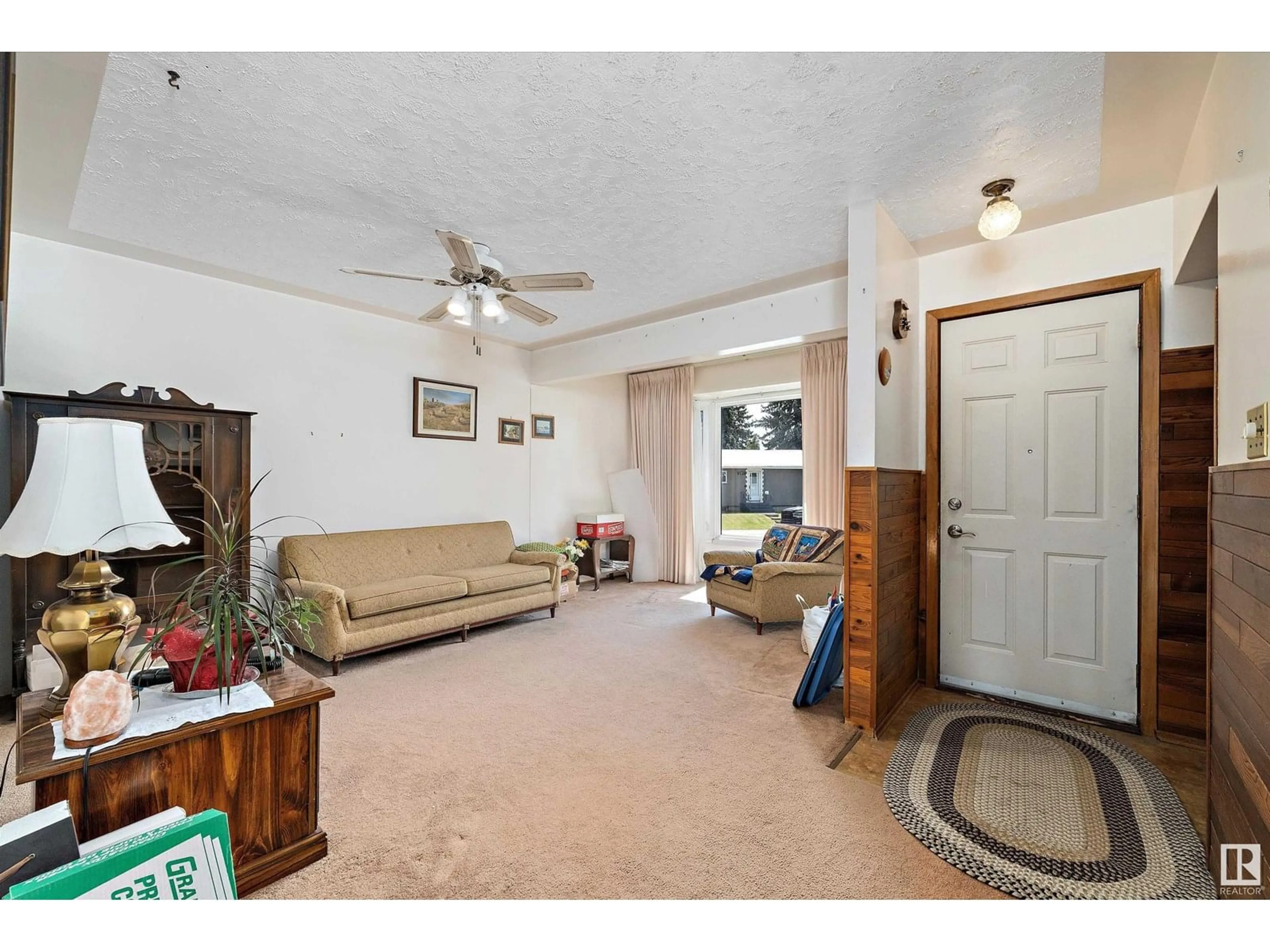 Living room with furniture, unknown for 13335 104 ST, Edmonton Alberta T5E4P2