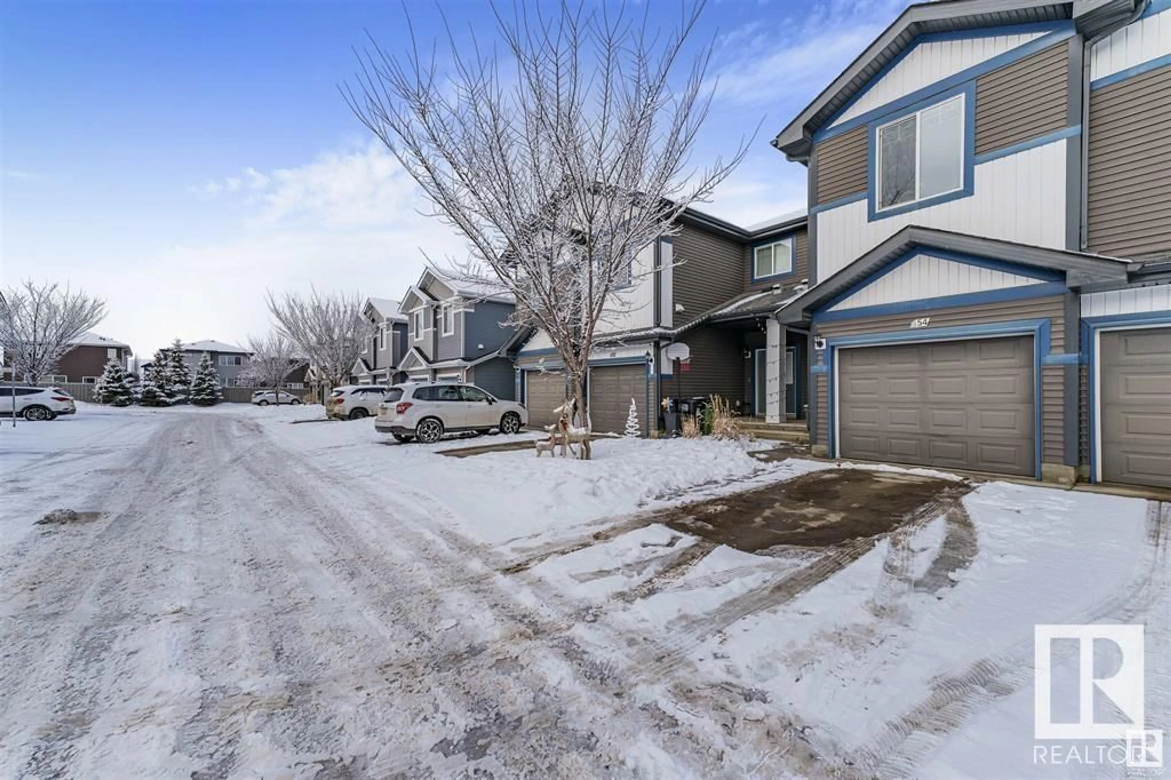 A pic from outside/outdoor area/front of a property/back of a property/a pic from drone, street for #54 - 8209 217 ST, Edmonton Alberta T5T6Z4