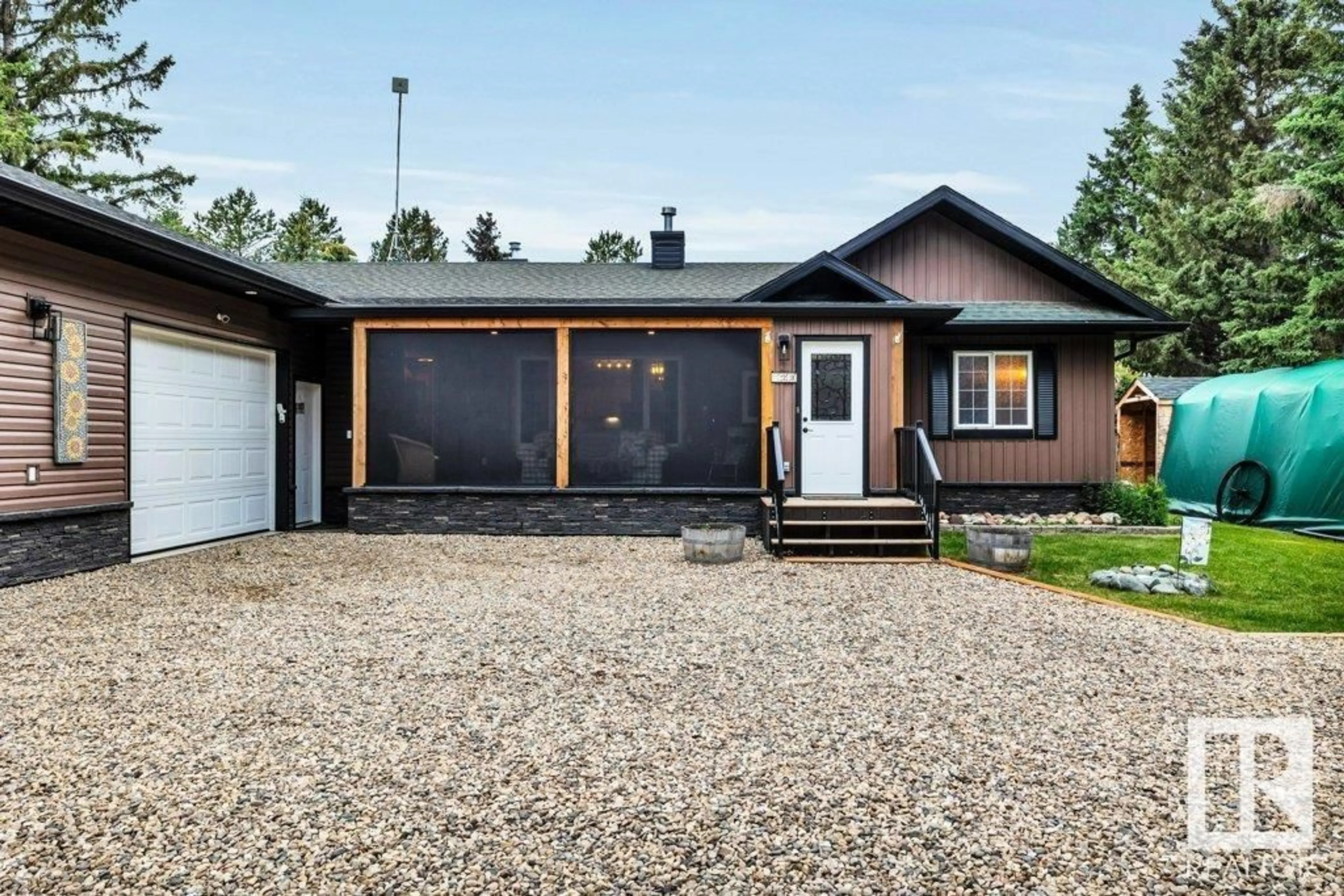 Home with vinyl exterior material, street for 462014 - 156 RNG RD 10, Rural Wetaskiwin County Alberta T0C2V0